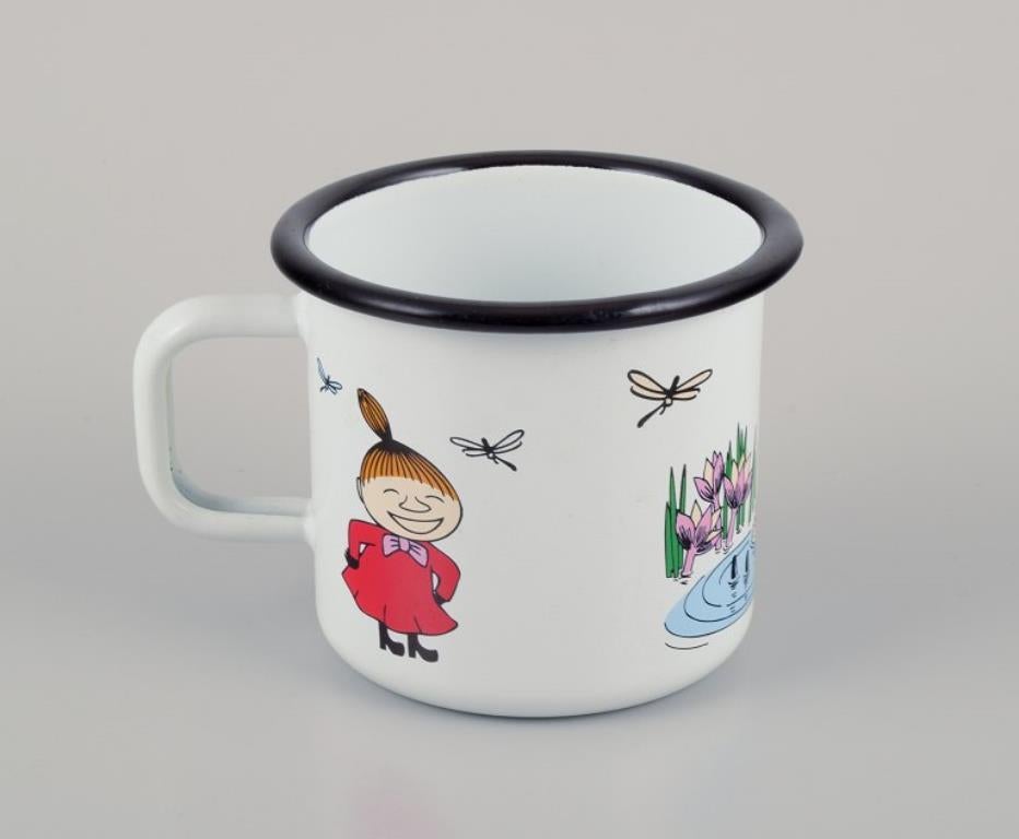 Finnish Muurla, Finland. Three enamel mugs with illustrations of Moomins For Sale