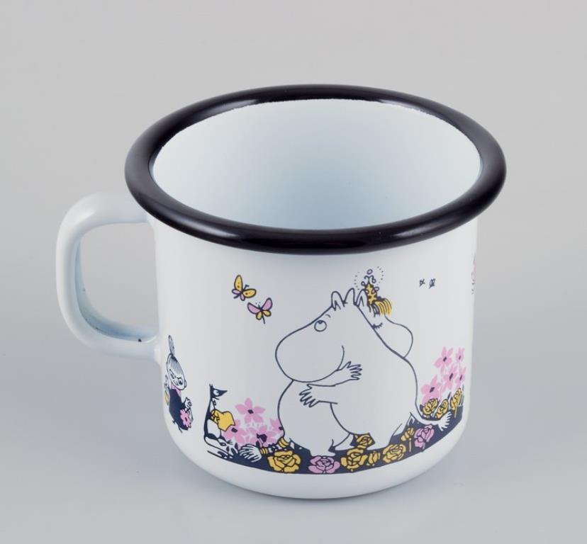 Muurla, Finlandia. Tres tazas esmaltadas con motivos de las historias de los Moomin Finlandés en venta