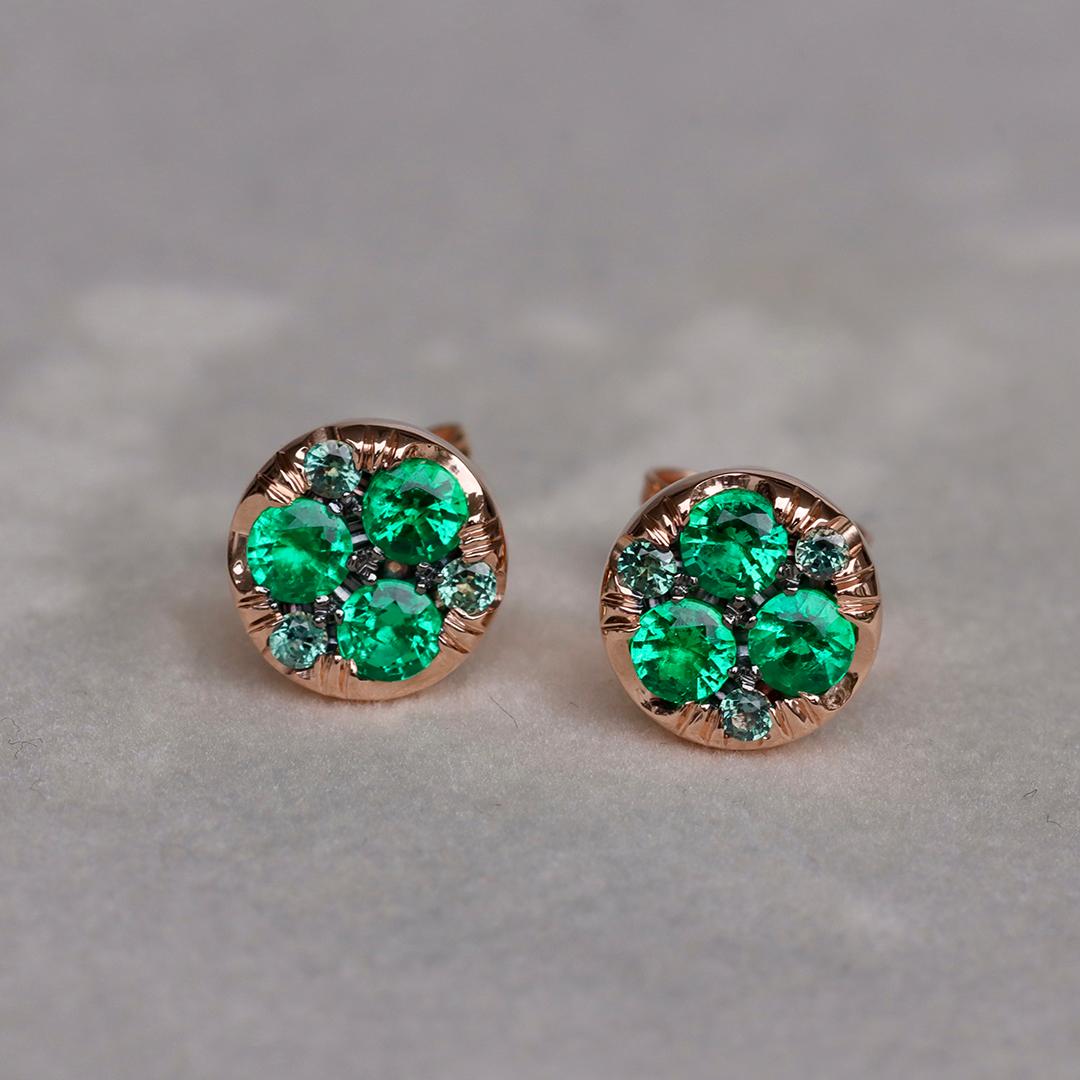 Discover vibrant allure with these rose gold stud earrings, handmade in Belgium by jewellery designer Joke Quick, featuring the rich, vivid greens of high-quality Muzo Colombian emeralds. Accented by delicate, tiny alexandrites that add a hint of