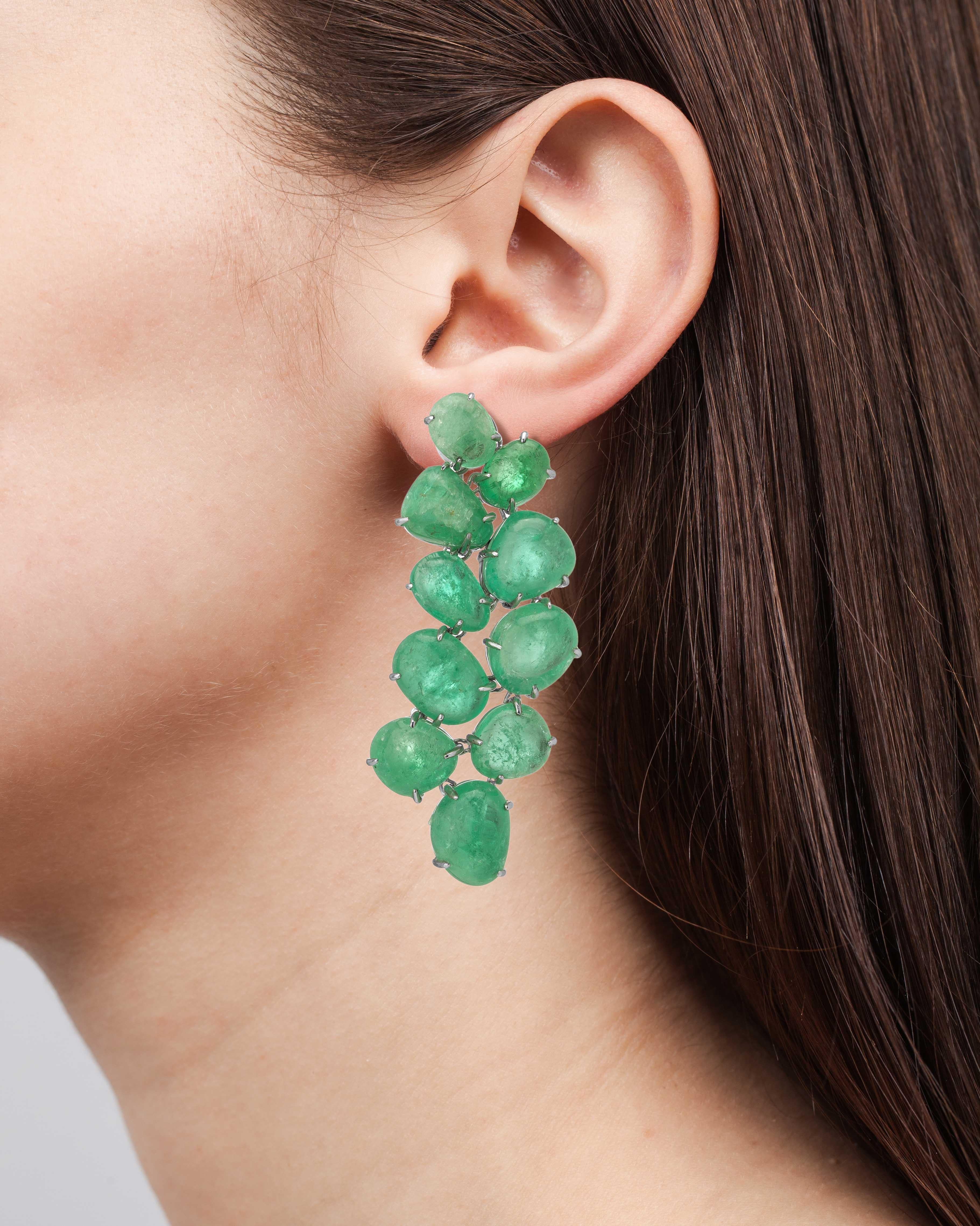 18 Karat white gold Chandelier earrings set with Muzo Colombian emeralds weighing 93.05 carats.

Muzo Emerald Colombia Heritage Muisca Earrings set with 93.05 carats Emerald.

Named in honor of the ancient indigenous people of the Muzo region of