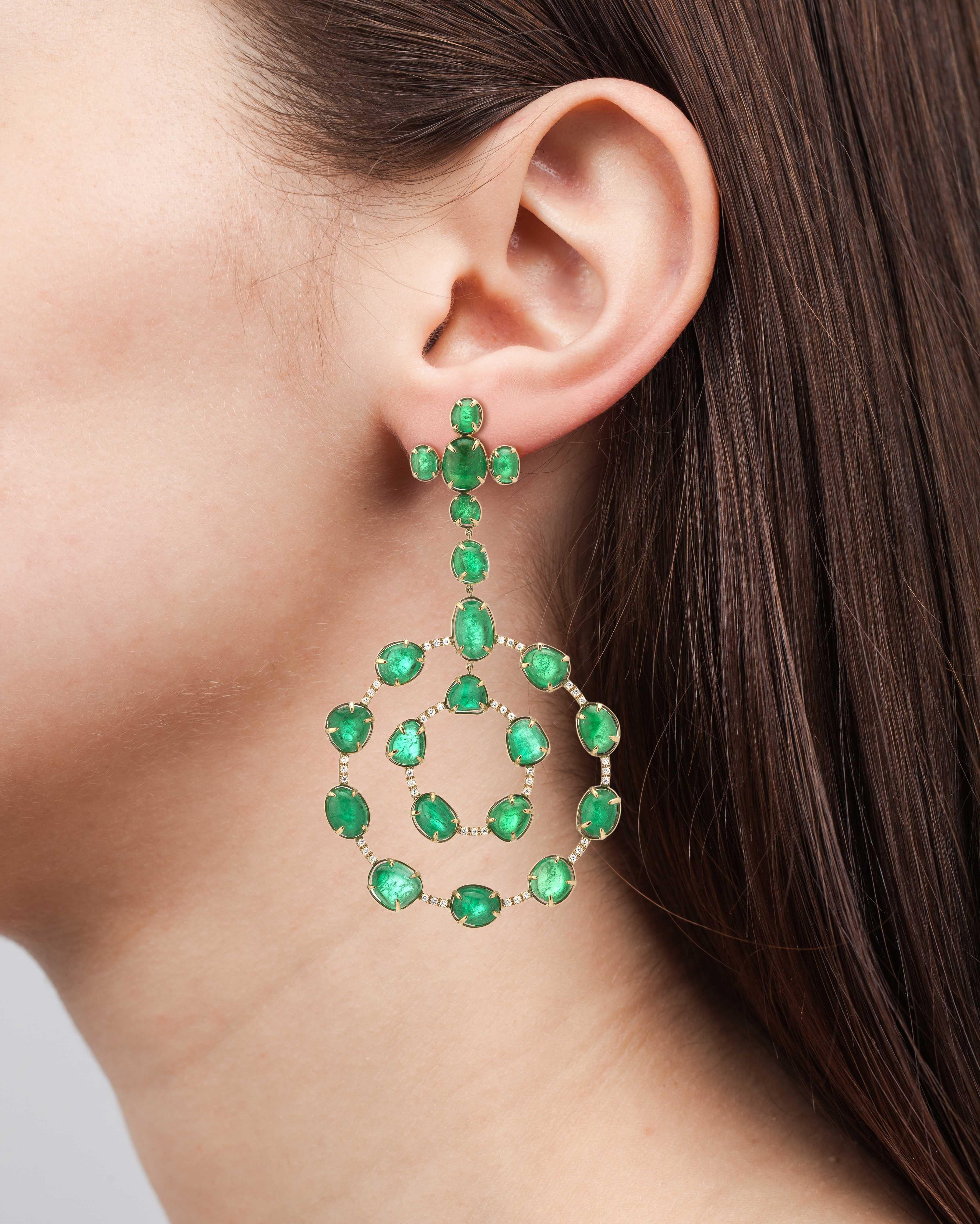 Contemporary statement earrings set in 18 Karat yellow gold with 82.37 carats of Muzo Colombian emeralds and 0.90 carats of diamond pave.

Muzo Emerald Colombia Heritage Royal Orb Earrings set with 82.37 carats Emerald.

One of 3 artifacts from the