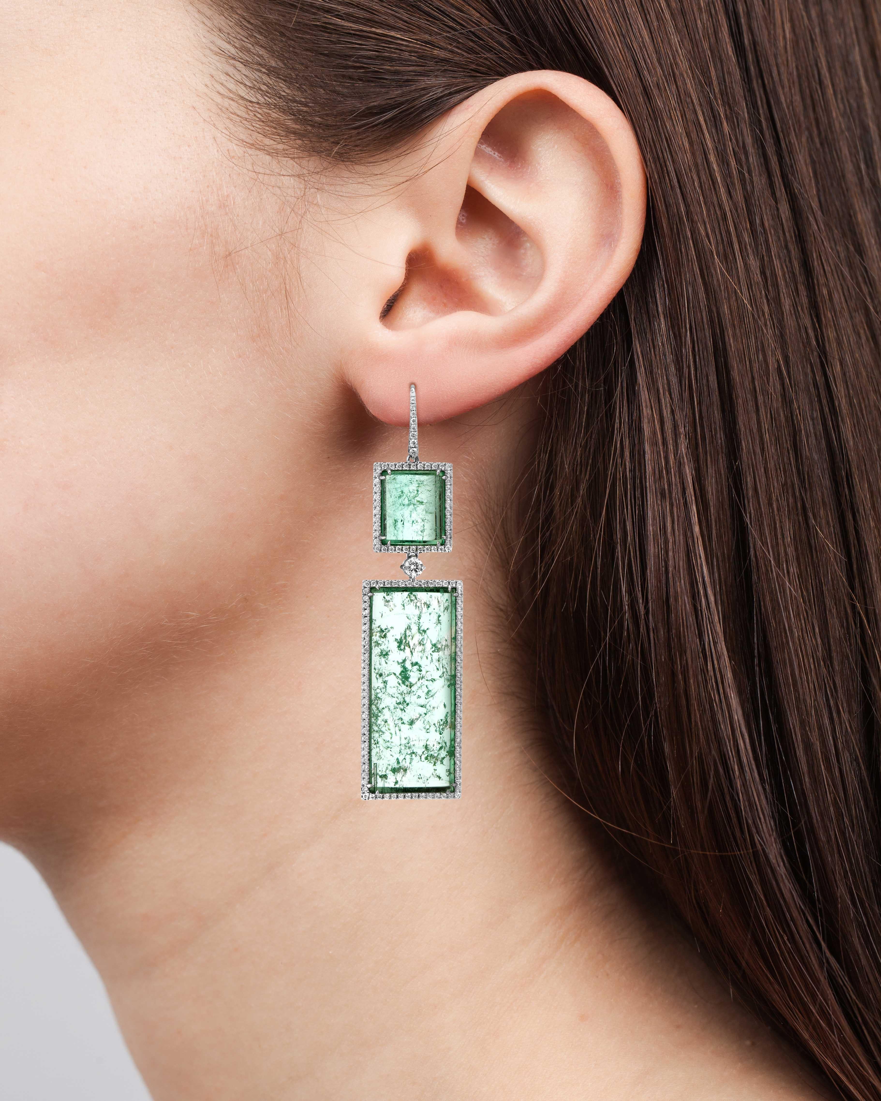 Handmade 18k white gold earrings with 34.51 carats of emeralds from the legendary Muzo mines and 1.64 carats of white diamonds. 

Muzo Emerald Colombia Heritage Atocha Earrings set with 34.51 carats Emerald

Atocha is inspired by a collection of