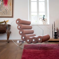 Sillón MW05 de estilo moderno para exterior con paneles transparentes.