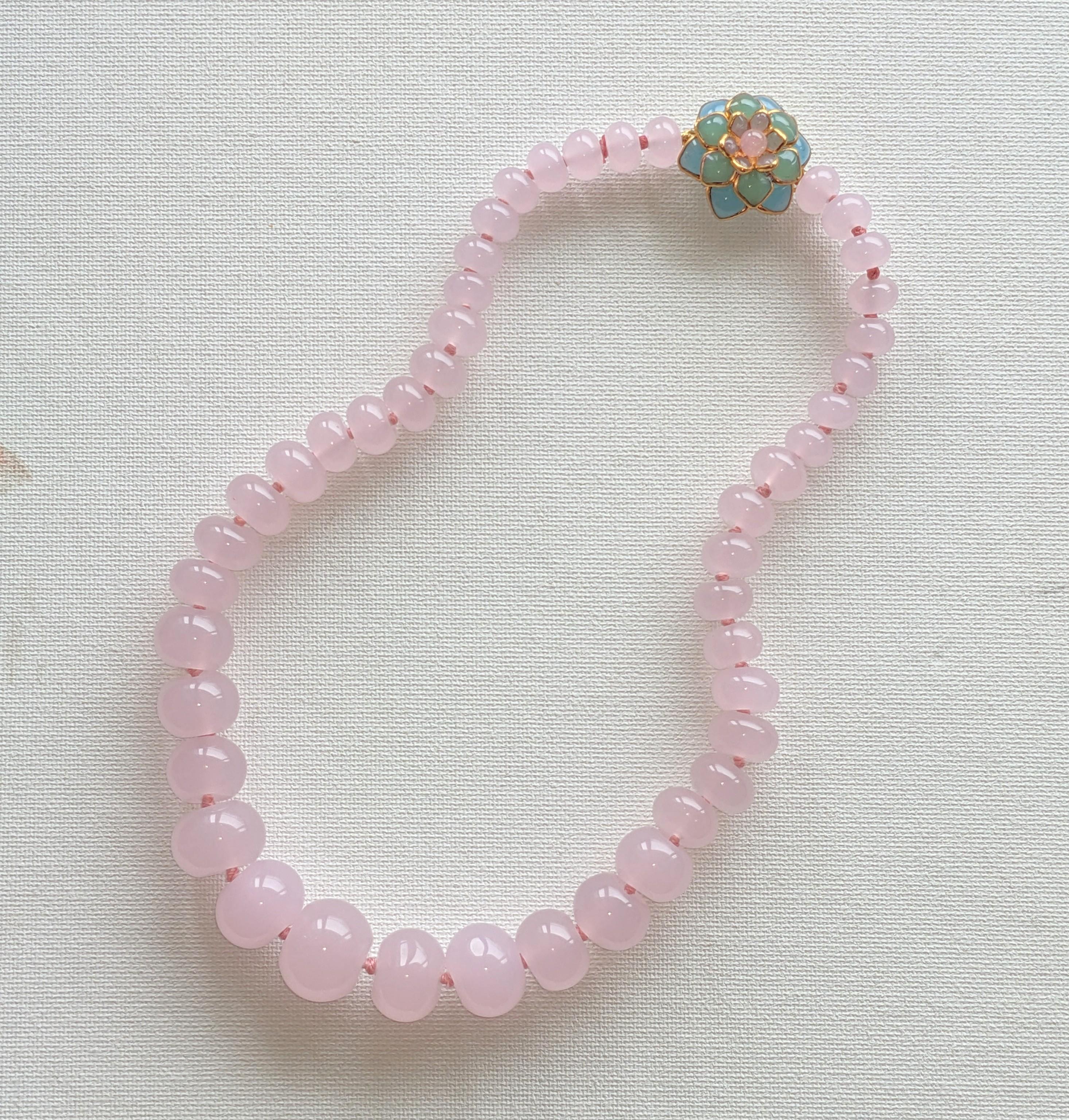 MWLC Graduated Rose Quartz Tumbled Bead Necklace with hand made pate de verre zinnia clasp in pastel tones. Hand knotted beads. Made in the Parisian studios of MWLC. Clasp 1