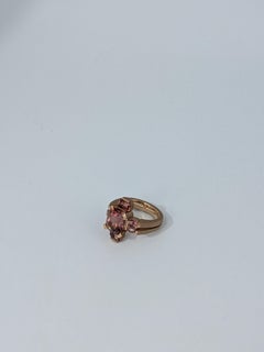 MXHM Ring aus 18k 750 Roségold mit Pfirsichturmalin und Malaya-Granaten