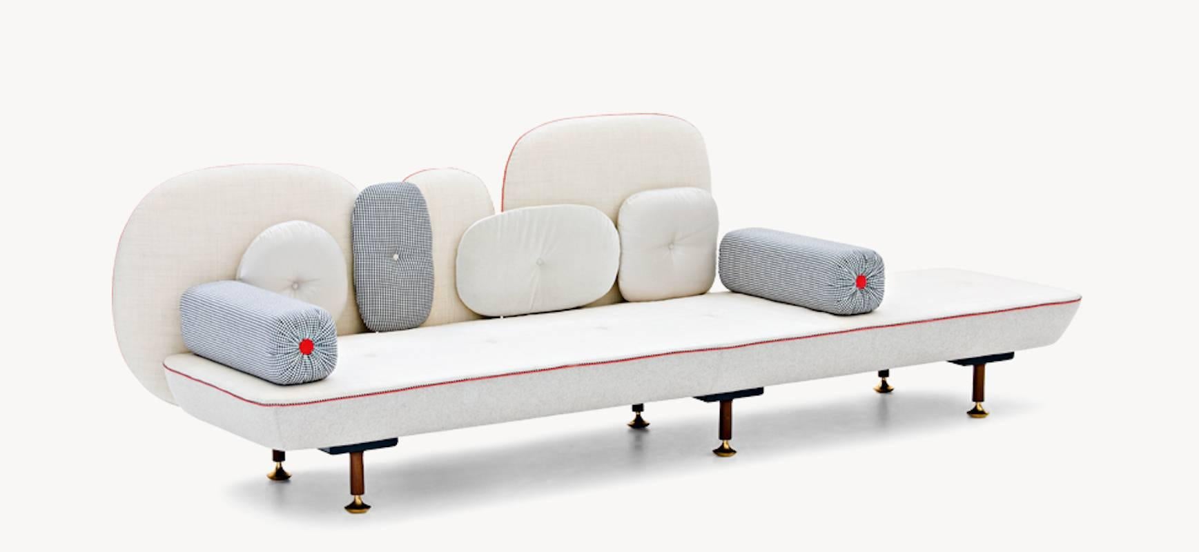 My Beautiful Backside is a collection of seats whose backrests are a composition of highly colored, floating cushions in various shapes. The wider your seat, the more cushions you can have. The use of oversize symbols, such as the buttons on cushion