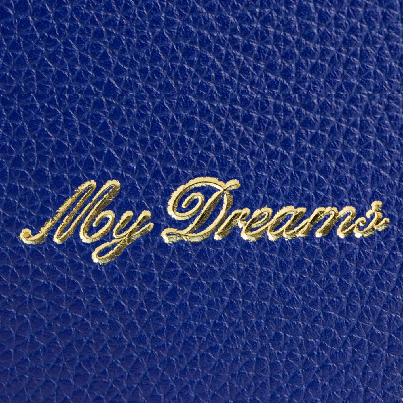 Keep a record of all your nocturnal visions with this fanciful dream journal. Its soft, naturally tanned, full-grain leather cover is in a deep shade of celestial blue. It features the word My Dreams and a moon and stars motif in eye-catching gold.