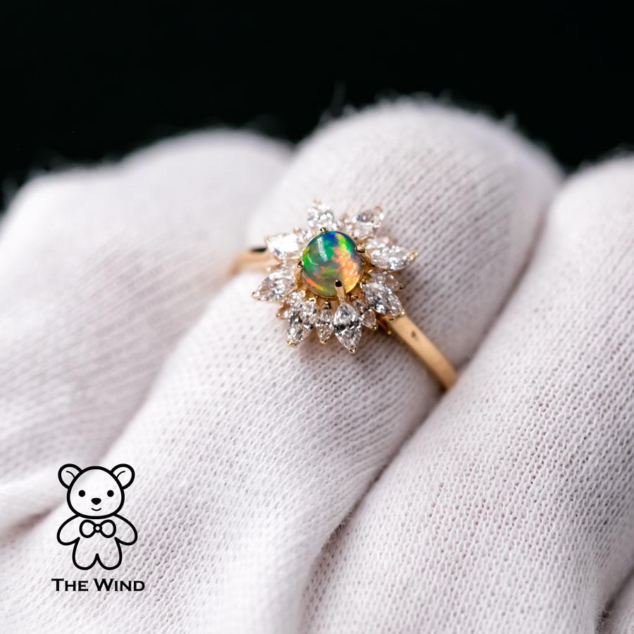 My Shining Star - 0.62 ct Marquise Cut Diamond Mexican Fire Opal Engagement Ring 18k Yellow Gold.

Design name: You are my shining star!

Design idea: Top quality fire opal hues in colors of the rainbow. 16 marquise cut diamonds shimmer from every