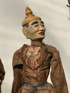 Myanmarese doll in brown robes and hat