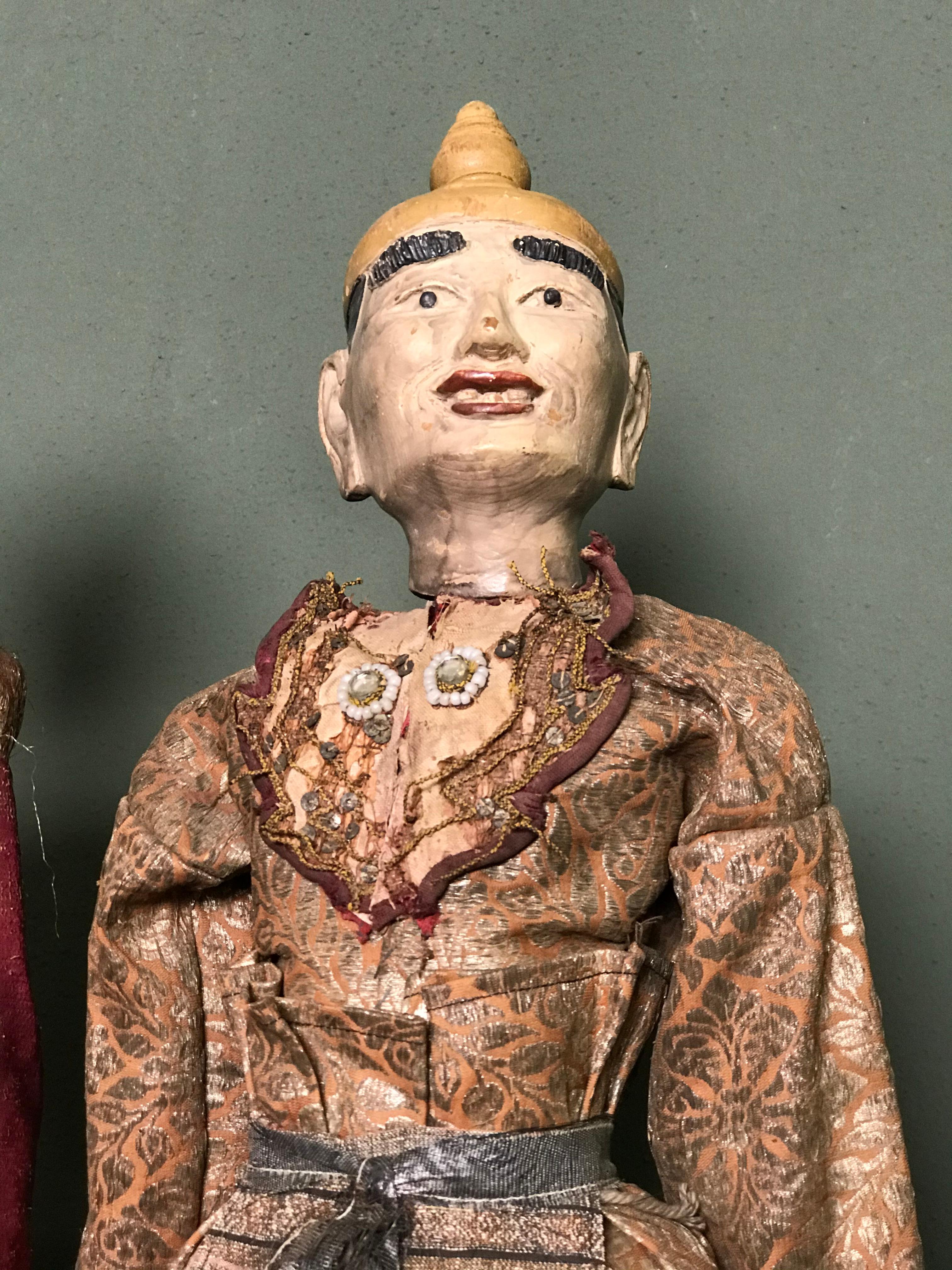 Wood Myanmarese doll in brown robes and hat For Sale