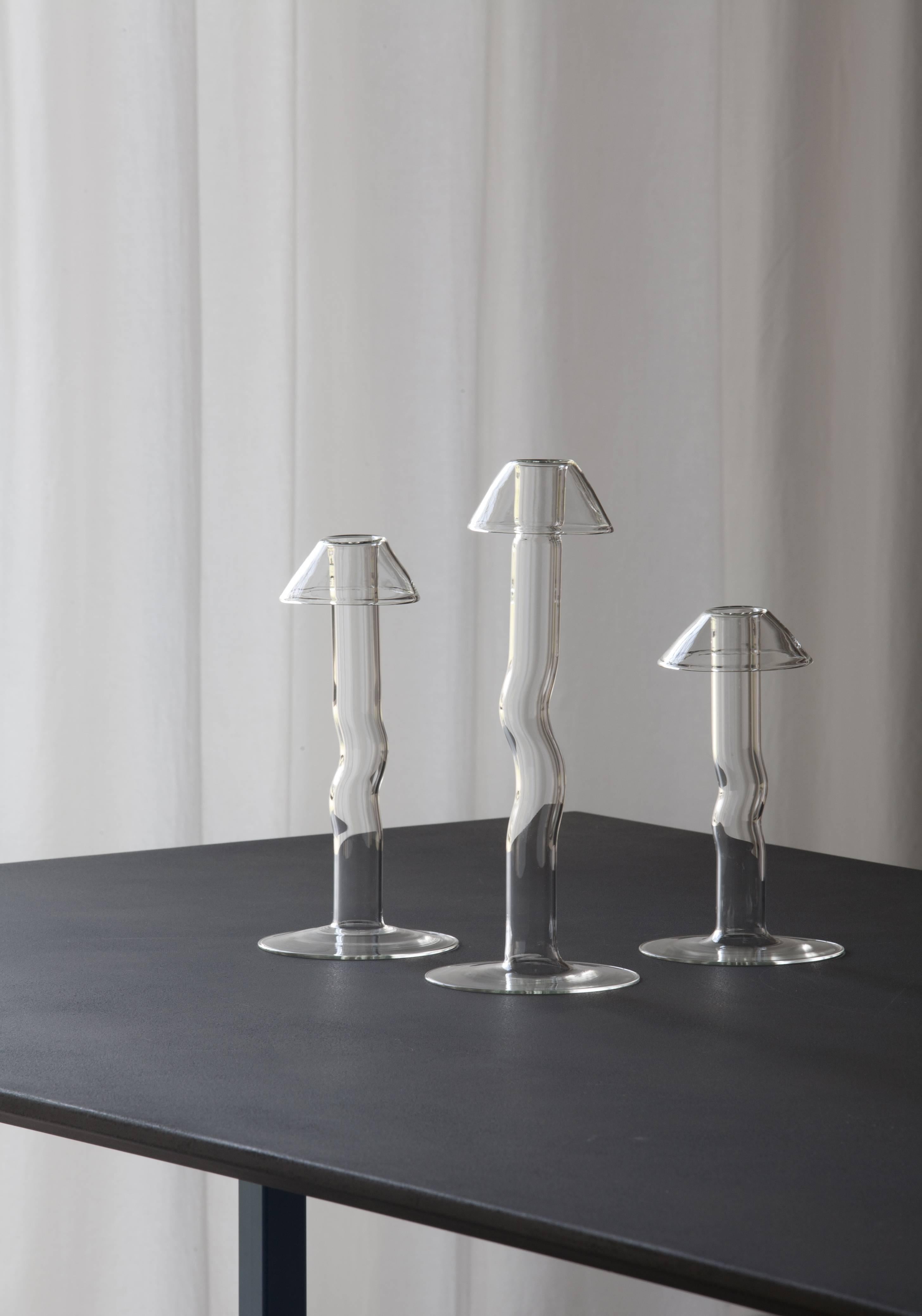Mykes is a collection of refined hand-blown glass candle stands produced in three different sizes with the shape of a mushroom. Inspired by ancient Greek culture, the mushroom was considered a symbol of life endowed with divine properties. The
