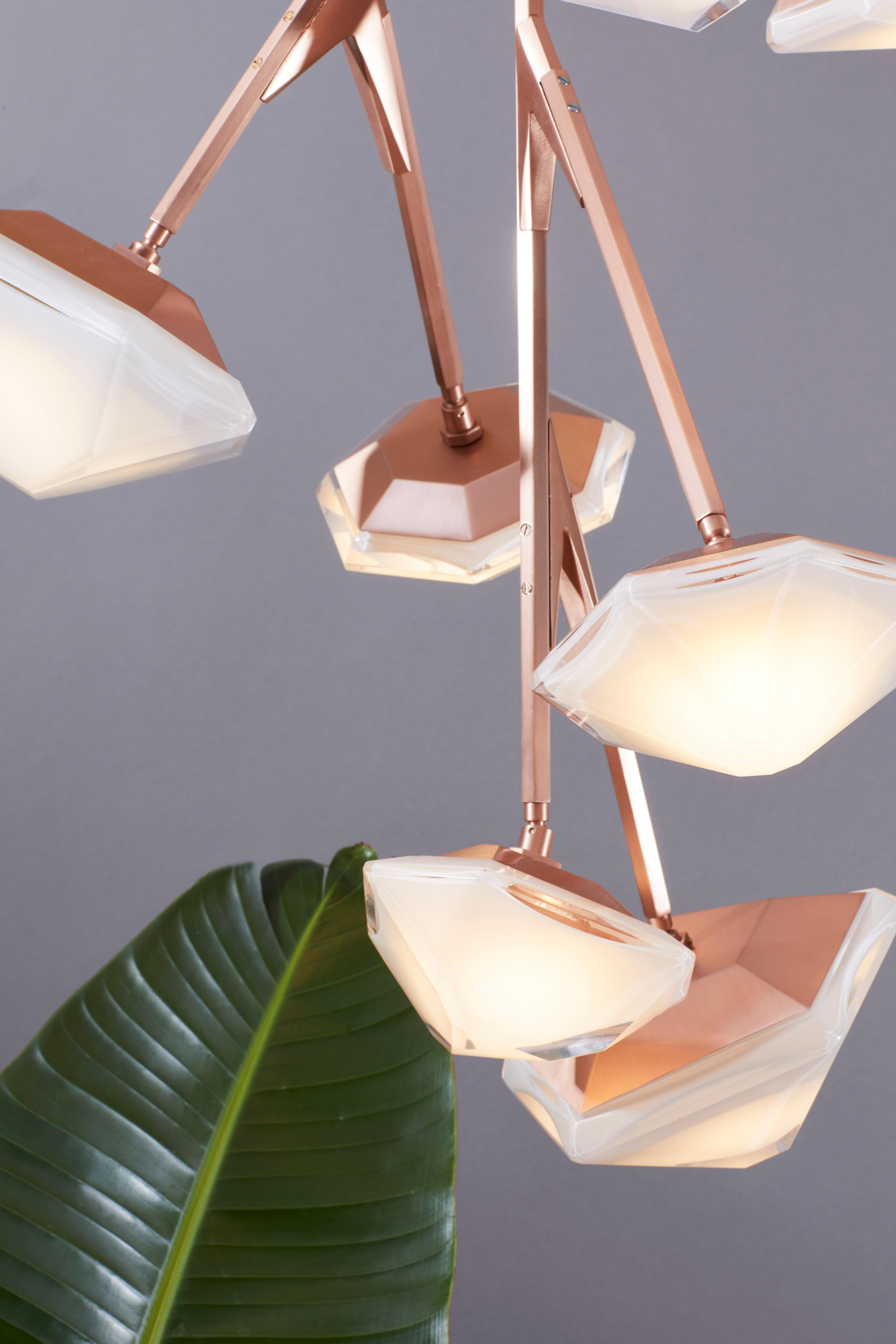 The Myriad series is the newest addition to the Gabriel Scott lighting family. Inspired by nature’s bioluminescent organisms, this modular series features the brand’s signature double-blown glass and satin metallic hardware. Its articulated stems