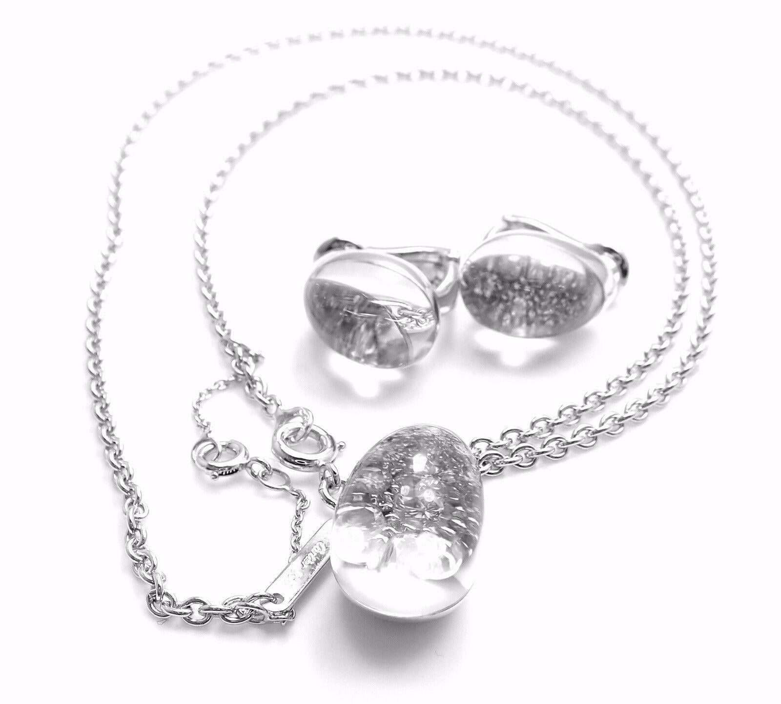 18k White Gold Diamond Rock Crystal Set Of Necklace & Earrings by Cartier From 
Myst de Cartier Collection. 
With Round brilliant cut diamonds VVS1 clarity, E color. 
These items come with Cartier boxes.
Measurements:
Pendant: 18mm x 11mm
Earrings: