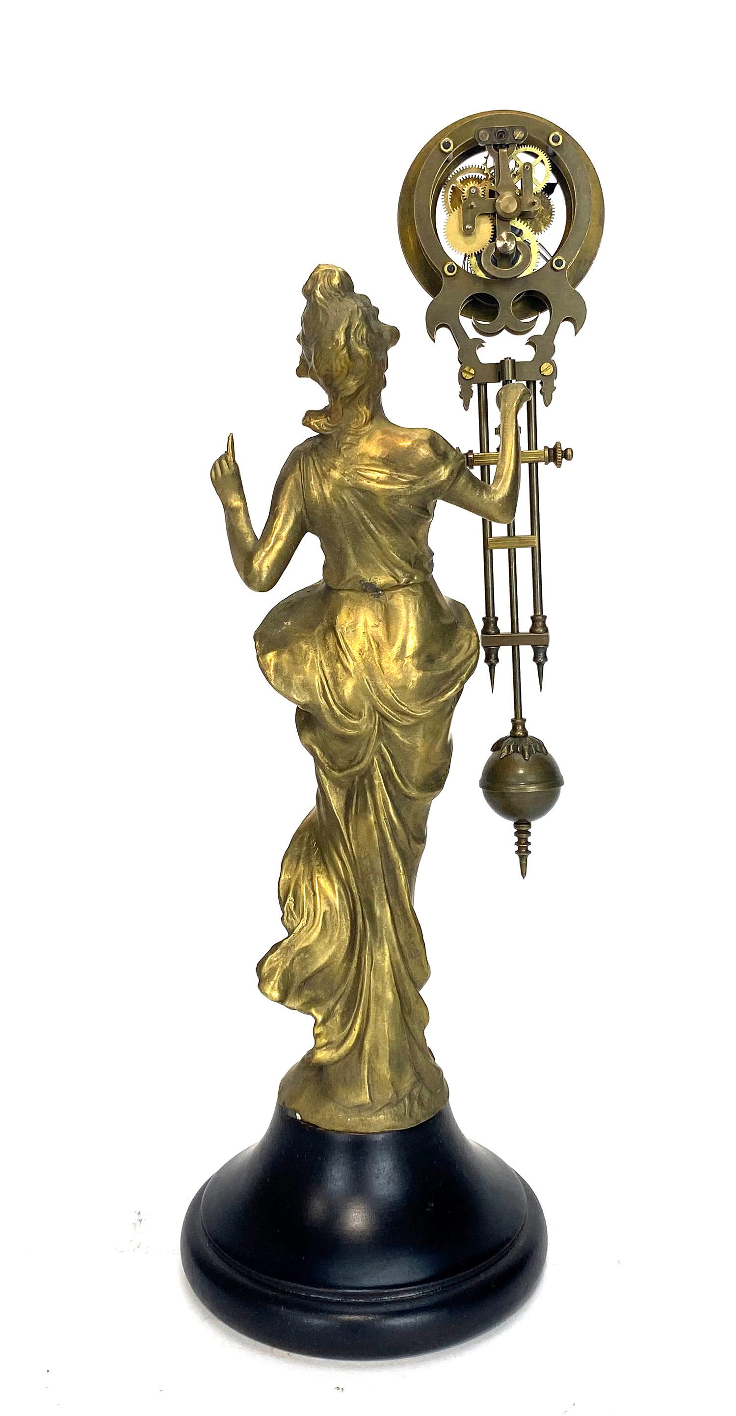 Mystery Brass Diana Figure Swinging Clock with 8 Day Skeleton Movement For Sale at 1stDibs