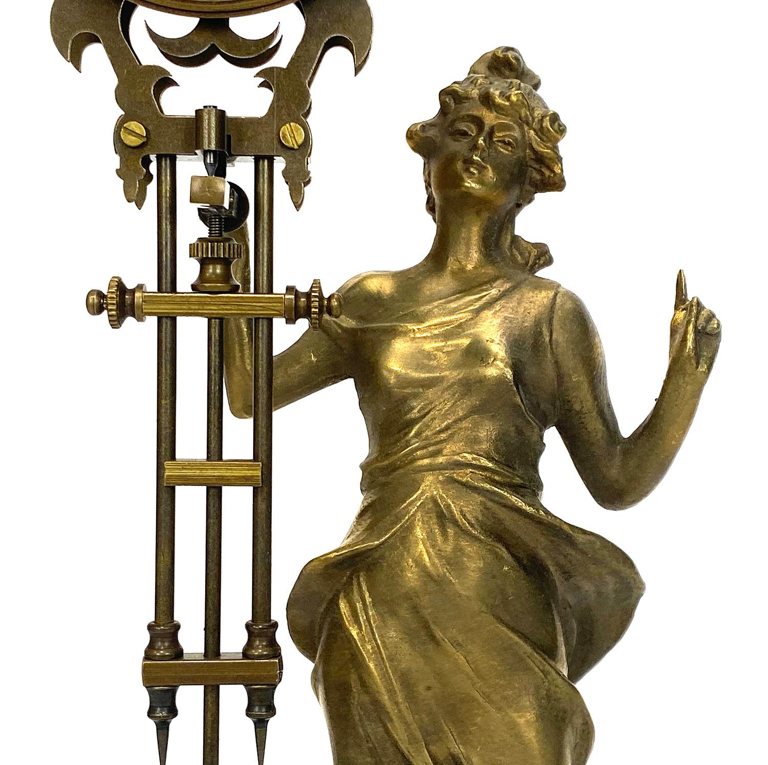 Mystery Brass Diana Figure Swinging Clock with 8 Day Skeleton Movement In Excellent Condition For Sale In Danville, CA