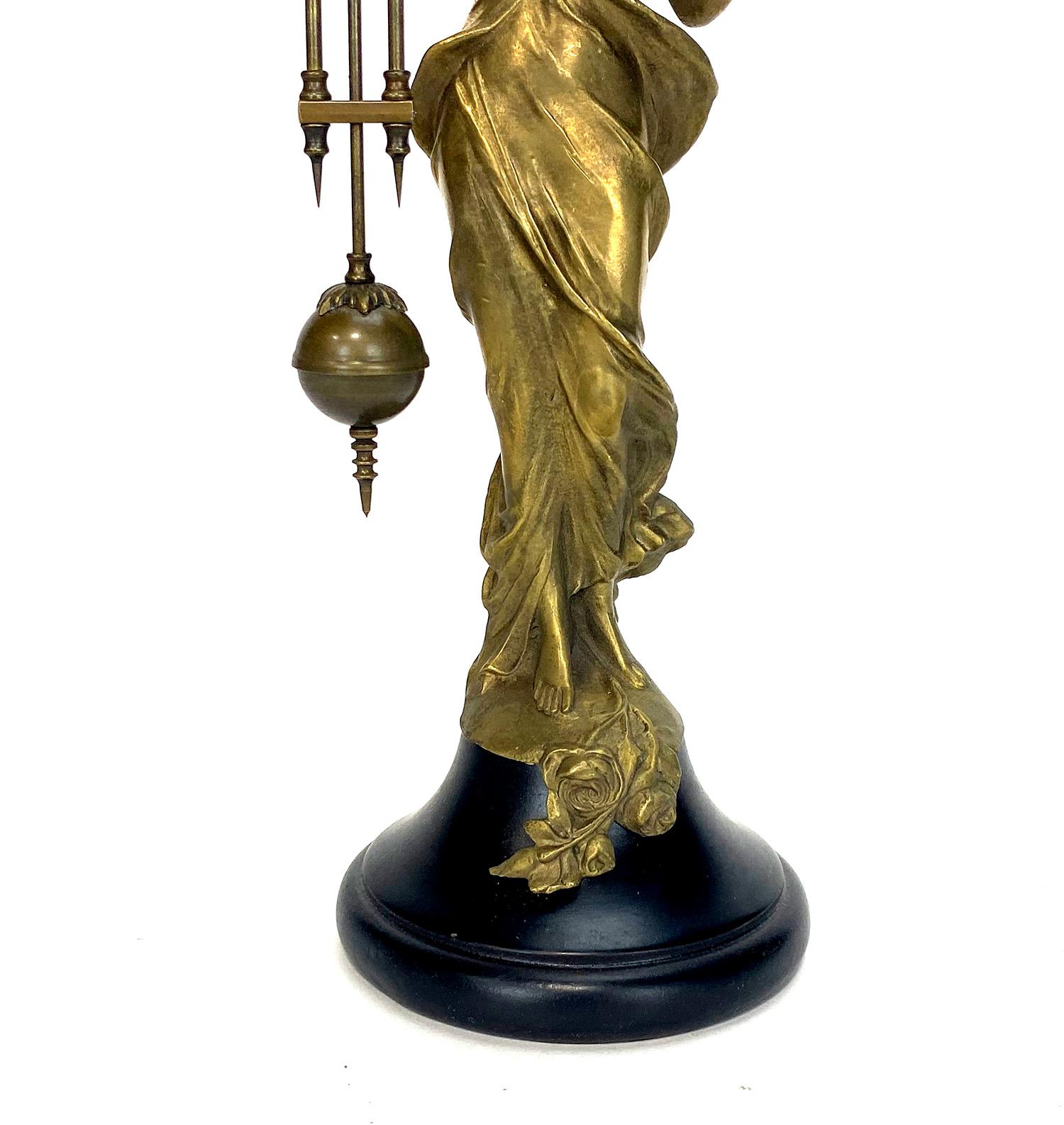 Contemporary Mystery Brass Diana Figure Swinging Clock with 8 Day Skeleton Movement For Sale