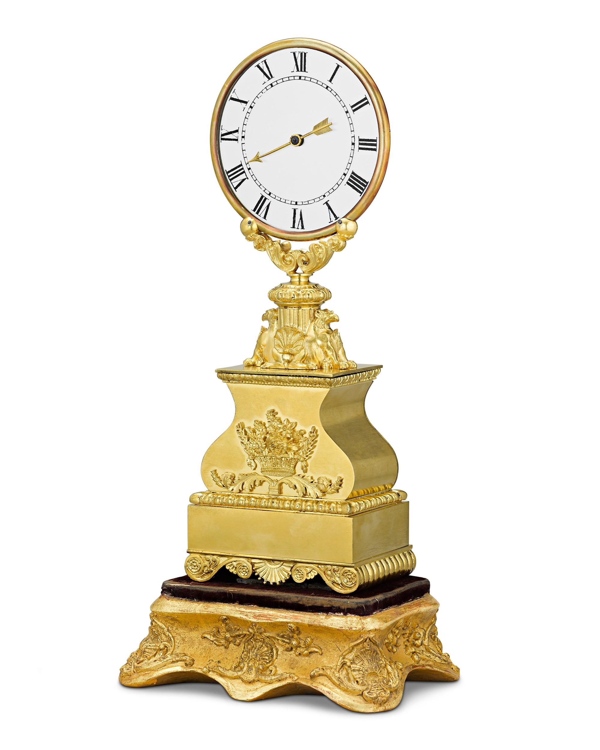 Rareté horlogère incontestable:: cette majestueuse pendule mystère en bronze doré est l'œuvre de Jean Eugène Robert-Houdin (1805-1871):: inventeur:: scientifique:: génie de la mécanique et de l'horlogerie et magicien-extraordinaire. Houdin a inspiré