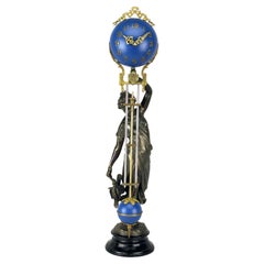 Mystery Cobalt Blue Ball 8 Day Brass Huntress Lady Statue Swinging Clock