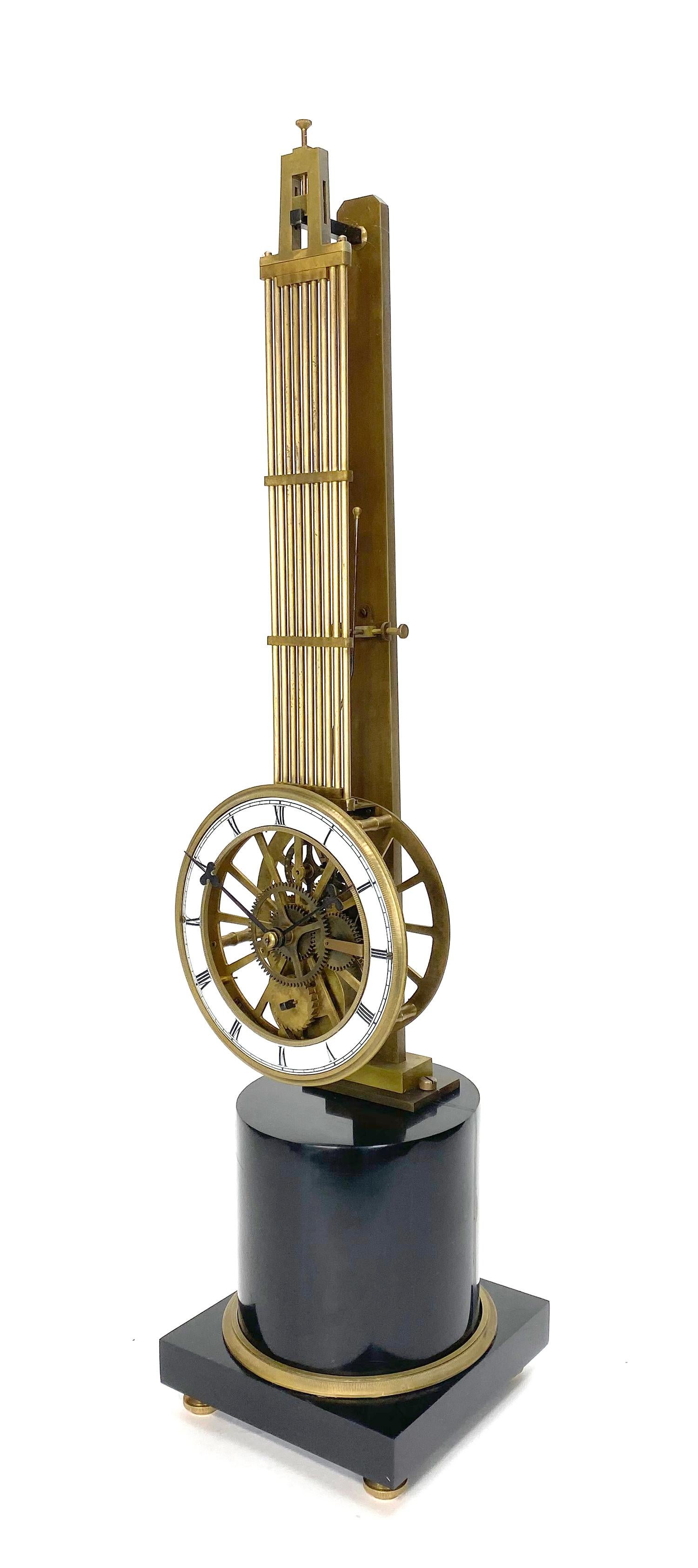 Mystery pinwheel upside down skeleton swinging clock with marble base.

Here is a very nice looking French style mystery upside down swinging clock. It's in brushed bras with a black marble base. It stands 19-1/2