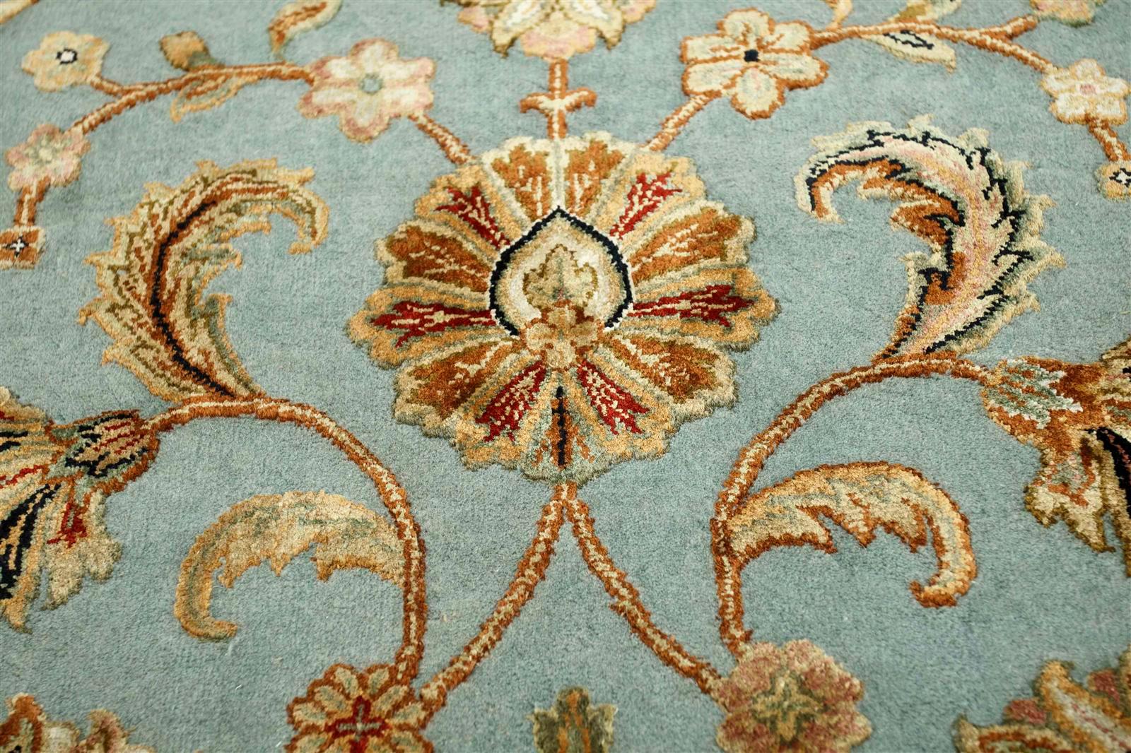 Traditional floral rug patterns have long been celebrated for their timeless beauty and intricate designs, offering cultural heritage to any space. This exclusive handmade carpet from our Aurora collection epitomizes this tradition, presenting a