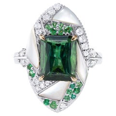 Bague en or blanc et jaune 18 carats avec tourmaline verte mystique