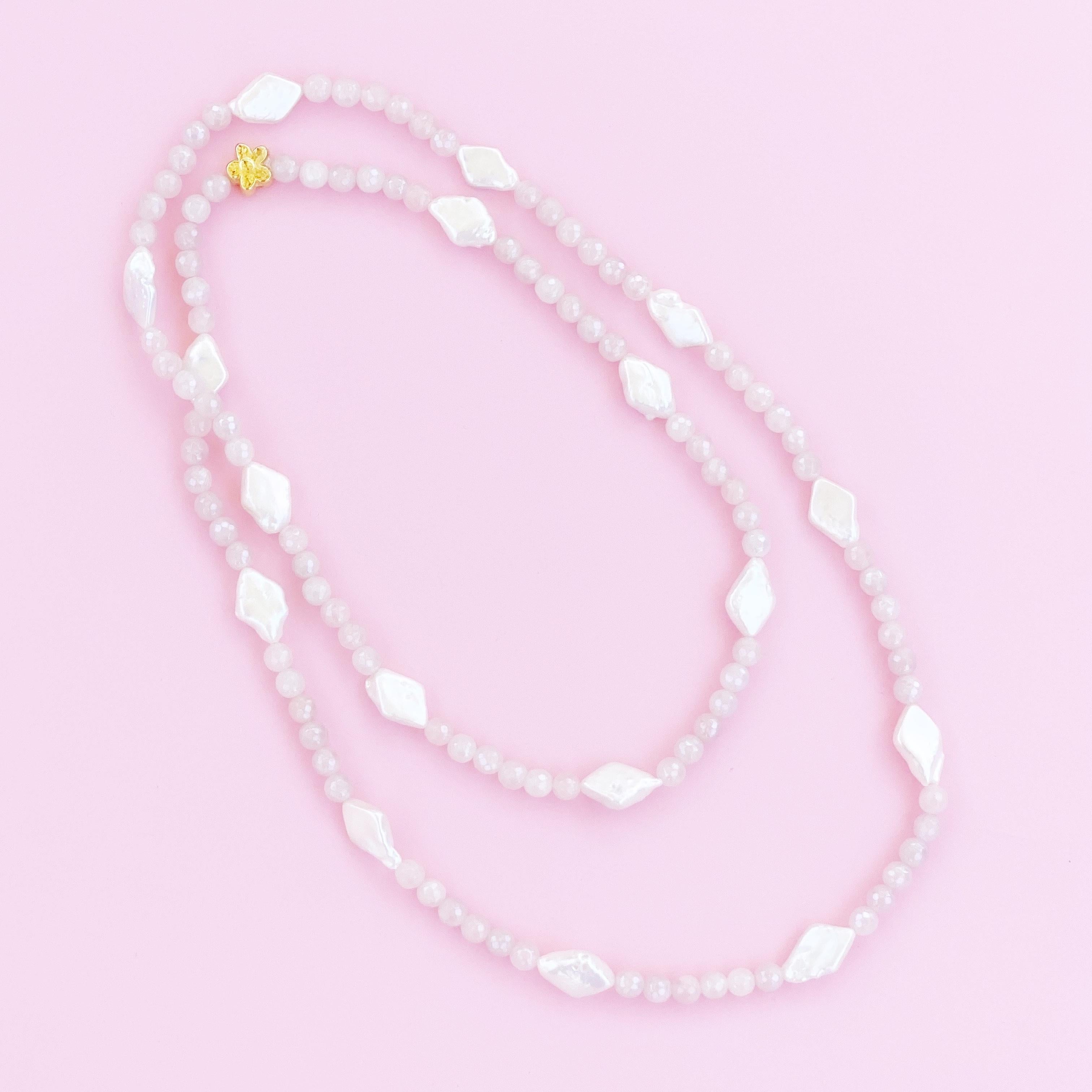 8mm faceted and polished Mystic Pink Aventurine gemstones flanked by diamond shaped baroque pearls.  

44