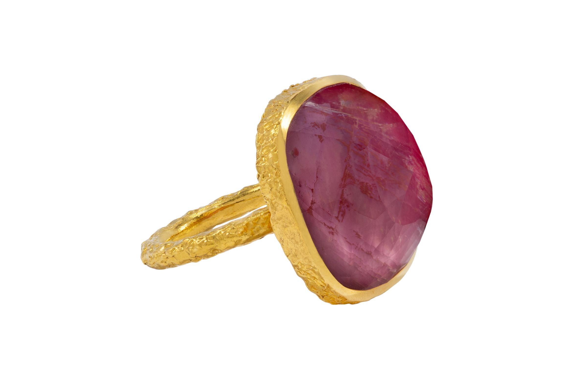 Mystical Red Corundum and Crystal ring is handmade in 22k gold and features Tagili Designs signature finish. The Crystal lays a top the Corundum and gives it magical depth and beauty and is part of the Celestial Collection. This collection captures