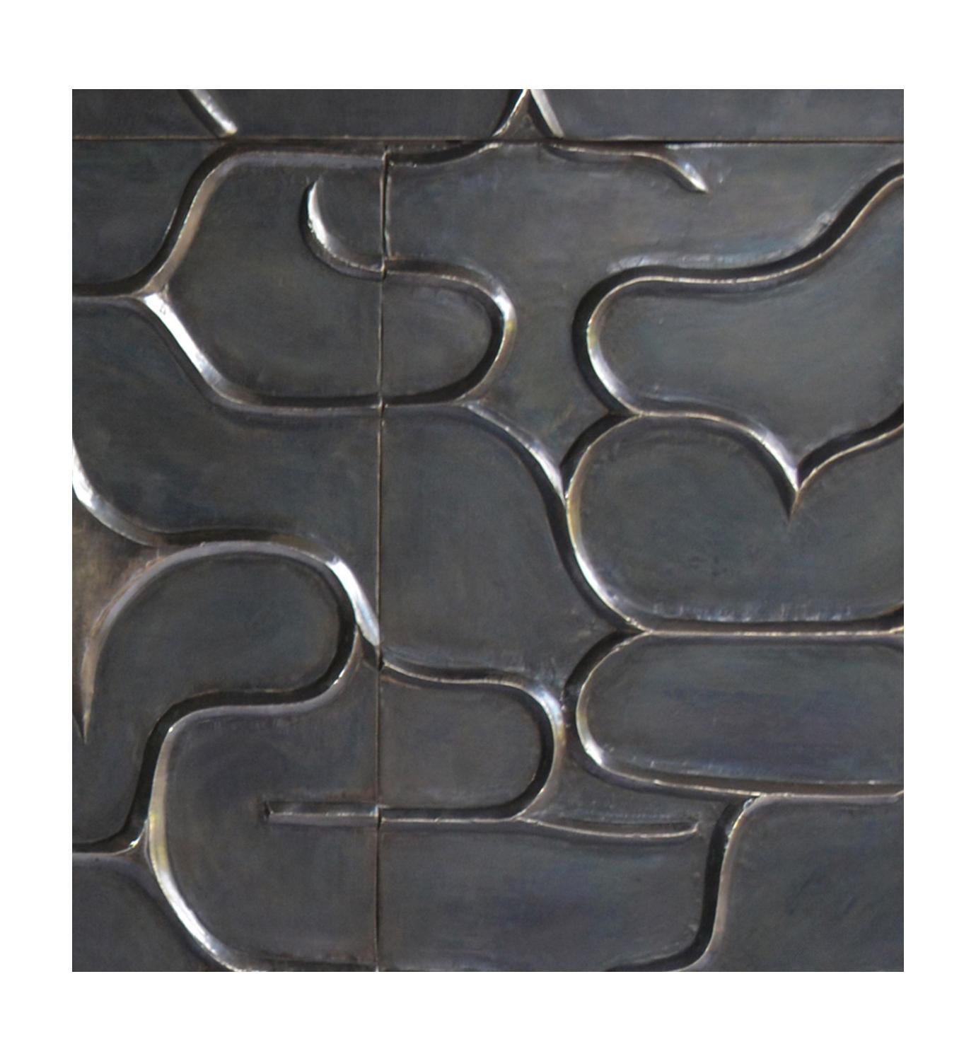 A remarkable piece in which each of the exterior faces is entirely sculpted out of a solid piece of wood by hand, creating a design inspired from one of Stephanie Odegard's rug designs. It is then covered with metal sheeting. The available options