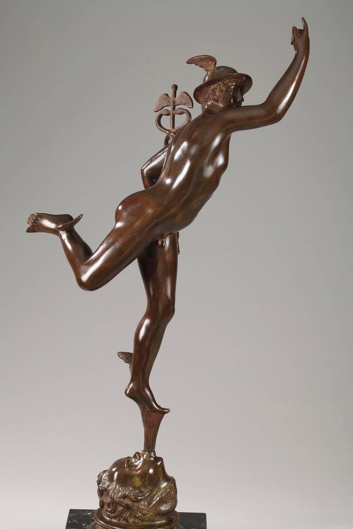 Large mythological bronze representing Mercury or Hermes, the messenger of the gods. He is wearing his winged, round petasos hat and carrying a caduceus in his left hand. The wings on his ankles enable him to move quickly and are one of his