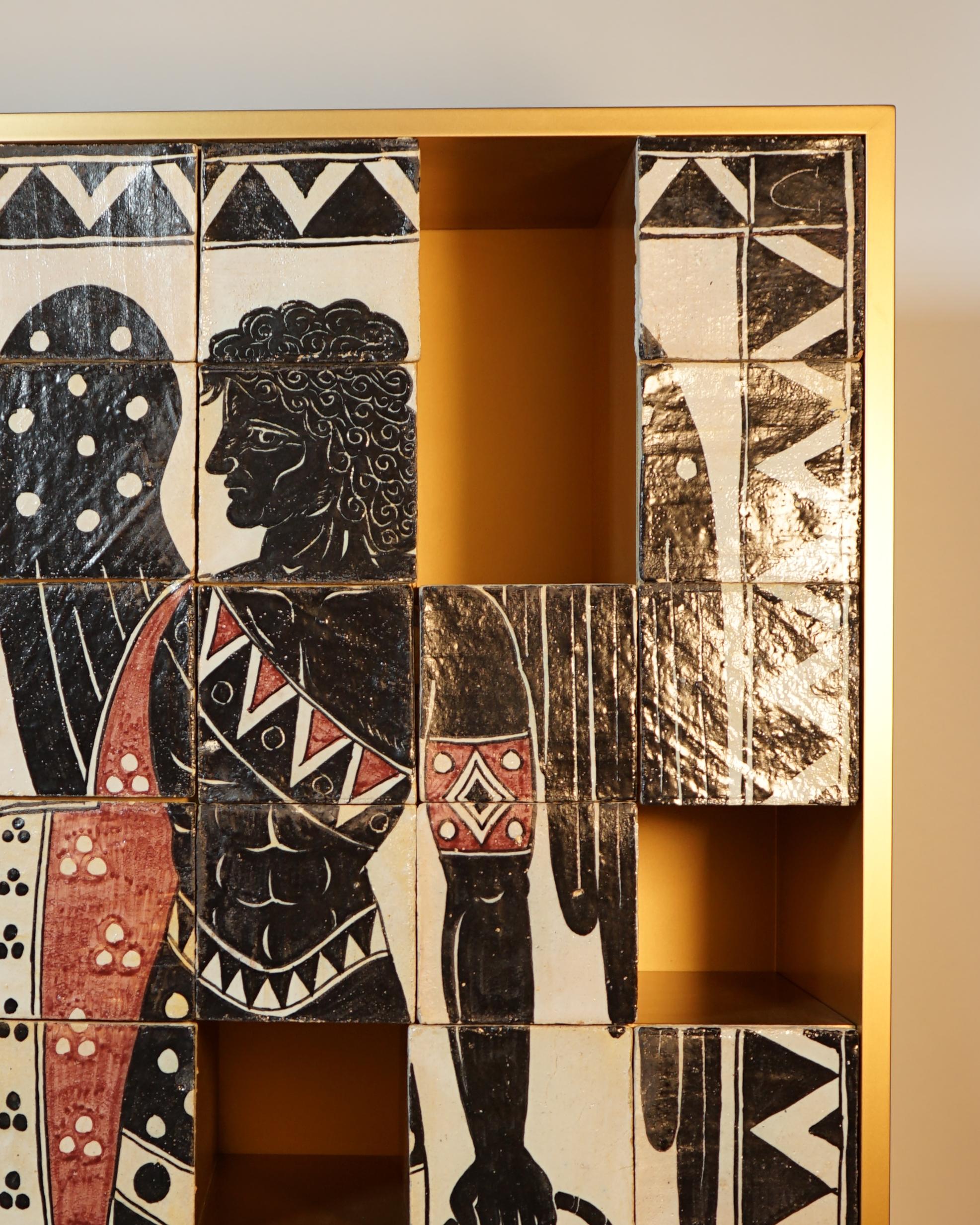Mythos Apollo container cabinet with wooden structure lacquered in gold color. Hand-decorated on terracotta tiles and with 10 legs in gold-colored lacquered metal. Single piece. Designed by Studio Superego for Superego Editions.

Biography
Superego
