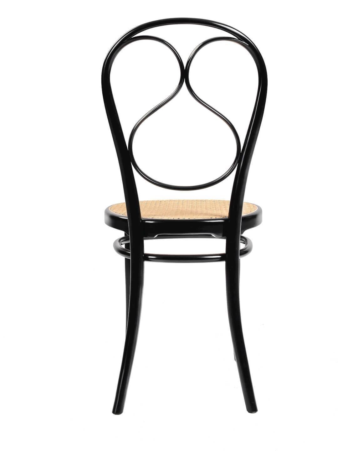 Supple, light, and elegant. This chair, designed in 1849, uses the new technique of steam bent beechwood, and clearly shows the philosophy aimed at simplifying the components to enable mass production. The seat is made from cane.