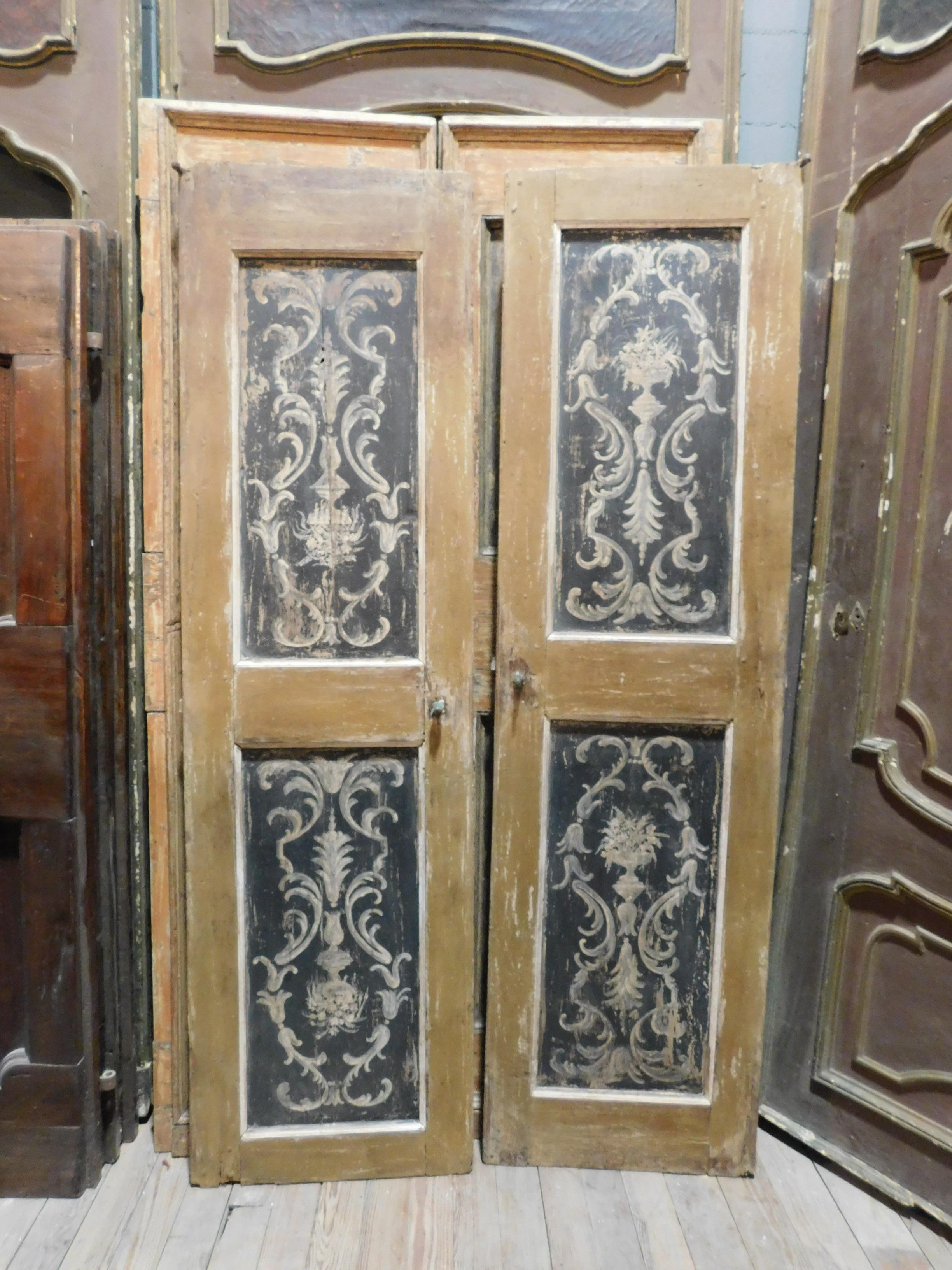 N.1 antique double-leaf interior doors, without frame but painted on an orange and black background, both front and back the same, very precious with a rich and well executed Baroque style painting, built and painted by master craftsmen in the 18th