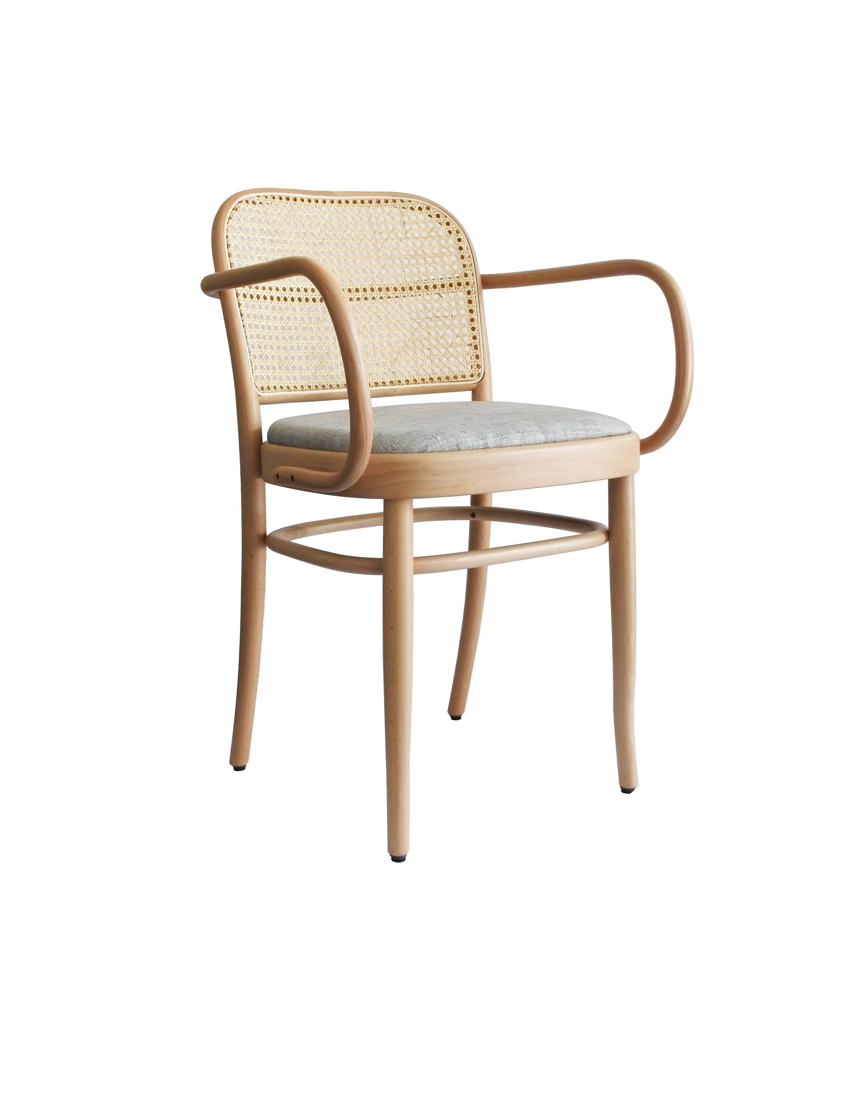 Steam bent beech chair and stool, designed by Josef Hoffmann in 1930. A timeless and modern design gives the chair N. 811 an outstanding comfort and lightness. Available in three versions: woven cane seat and backrest, upholstered seat and woven