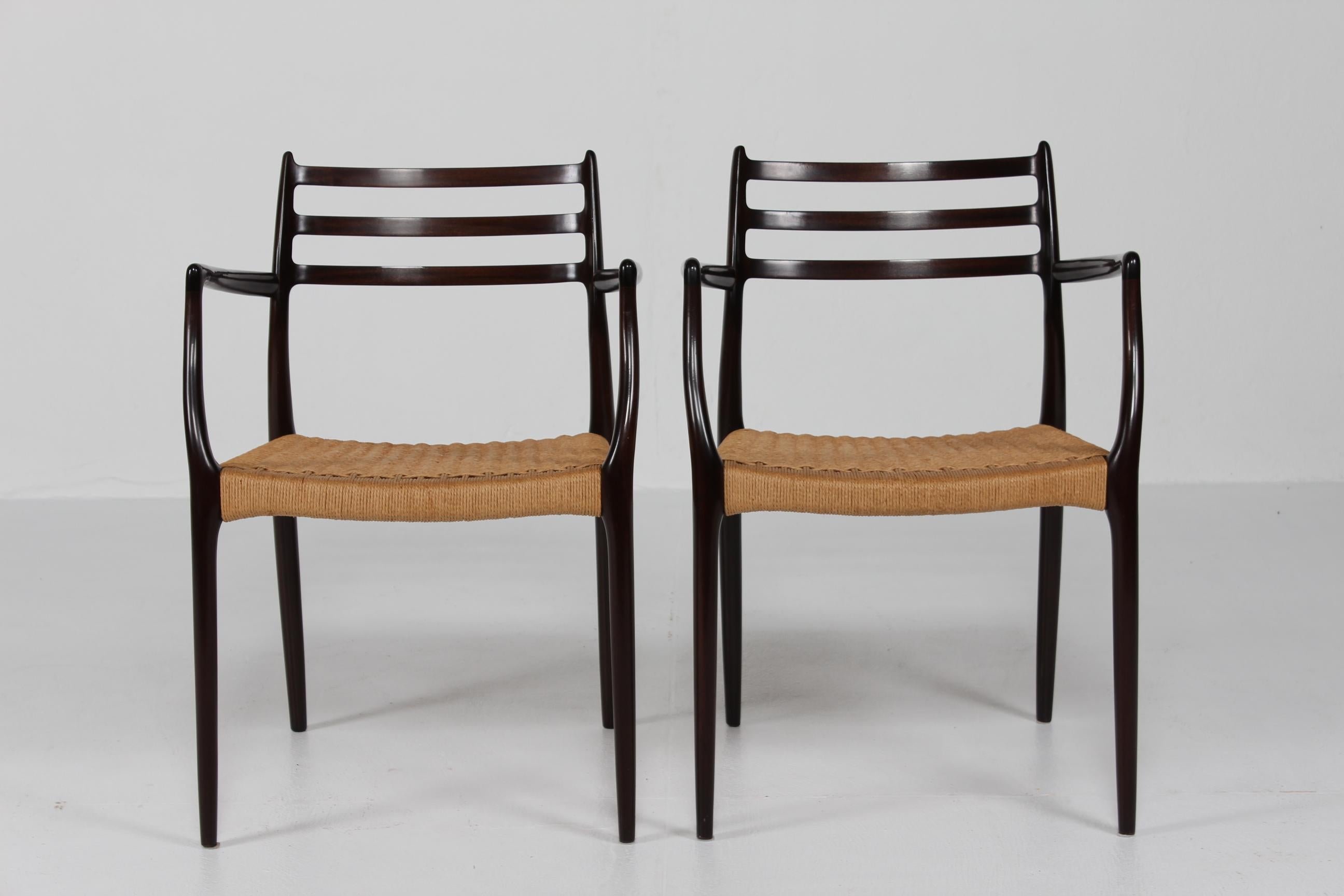 Mid-Century Modern N. O. Møller Pair of Armchairs No. 62 of Mahogany Made by J.L. Møller in Denmark For Sale