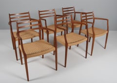 N. O. Møller Set of Six Striking Armchairs, Model 62, Walnut and Papercord