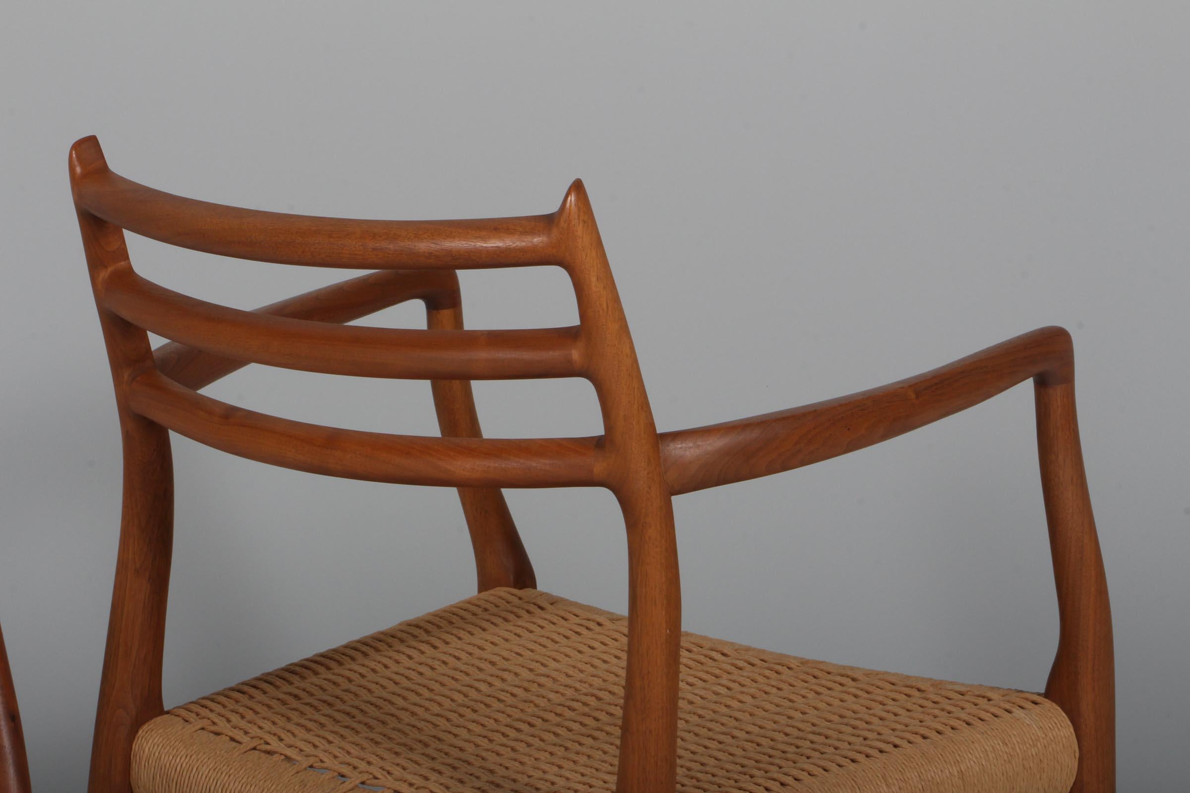 Mid-20th Century N. O. Møller Set of Six Striking Armchairs, Model 62, Walnut and Papercord