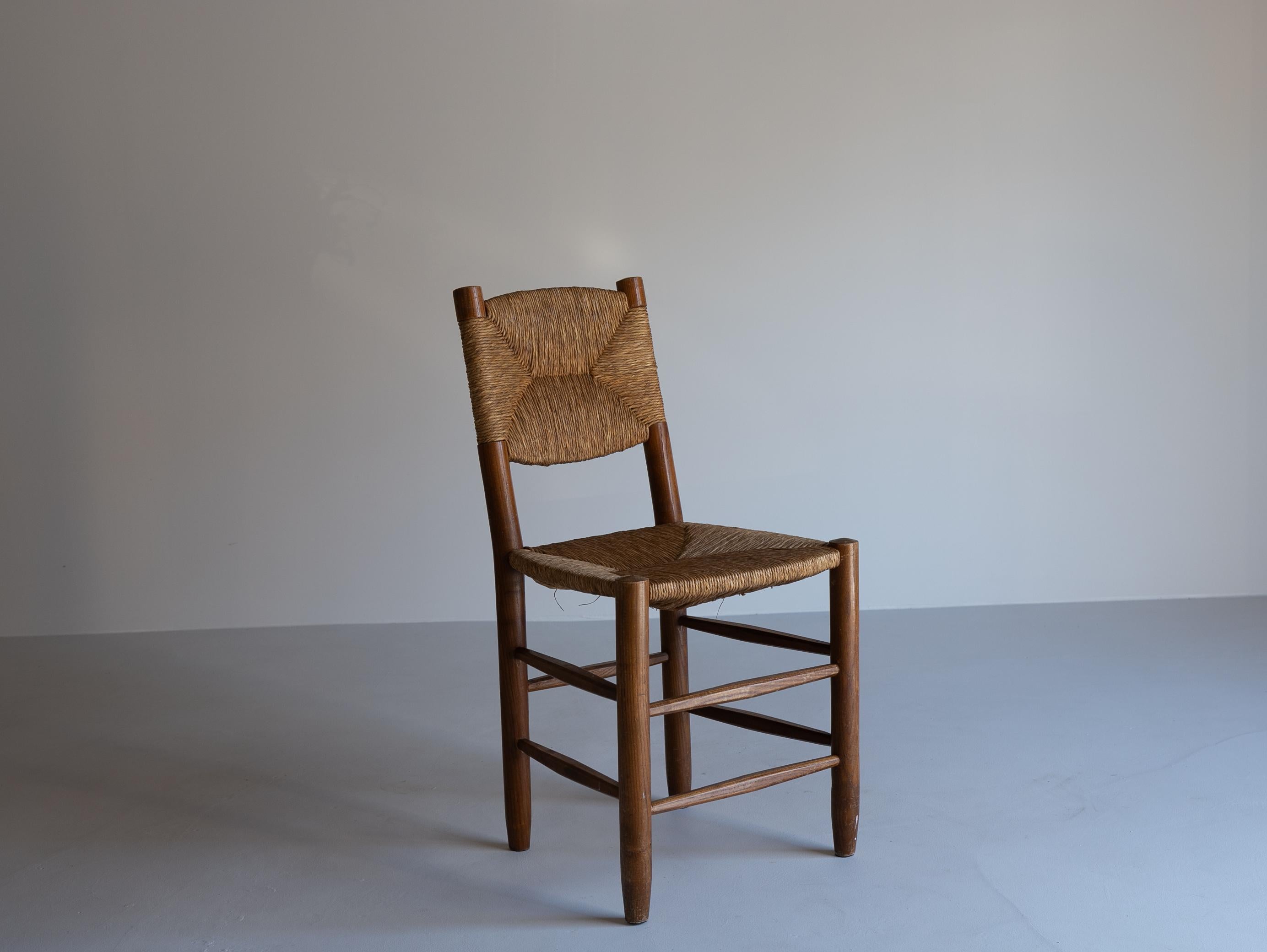 n°19 'Bauche' chair by Charlotte Perriand

This is the famous 'Bauche n°19' chair, designed by Charlotte Perriand for Steph Simon in the 1950s.
The structure consists of four round legs connected by posts, all made of ash.
The seat and backrest