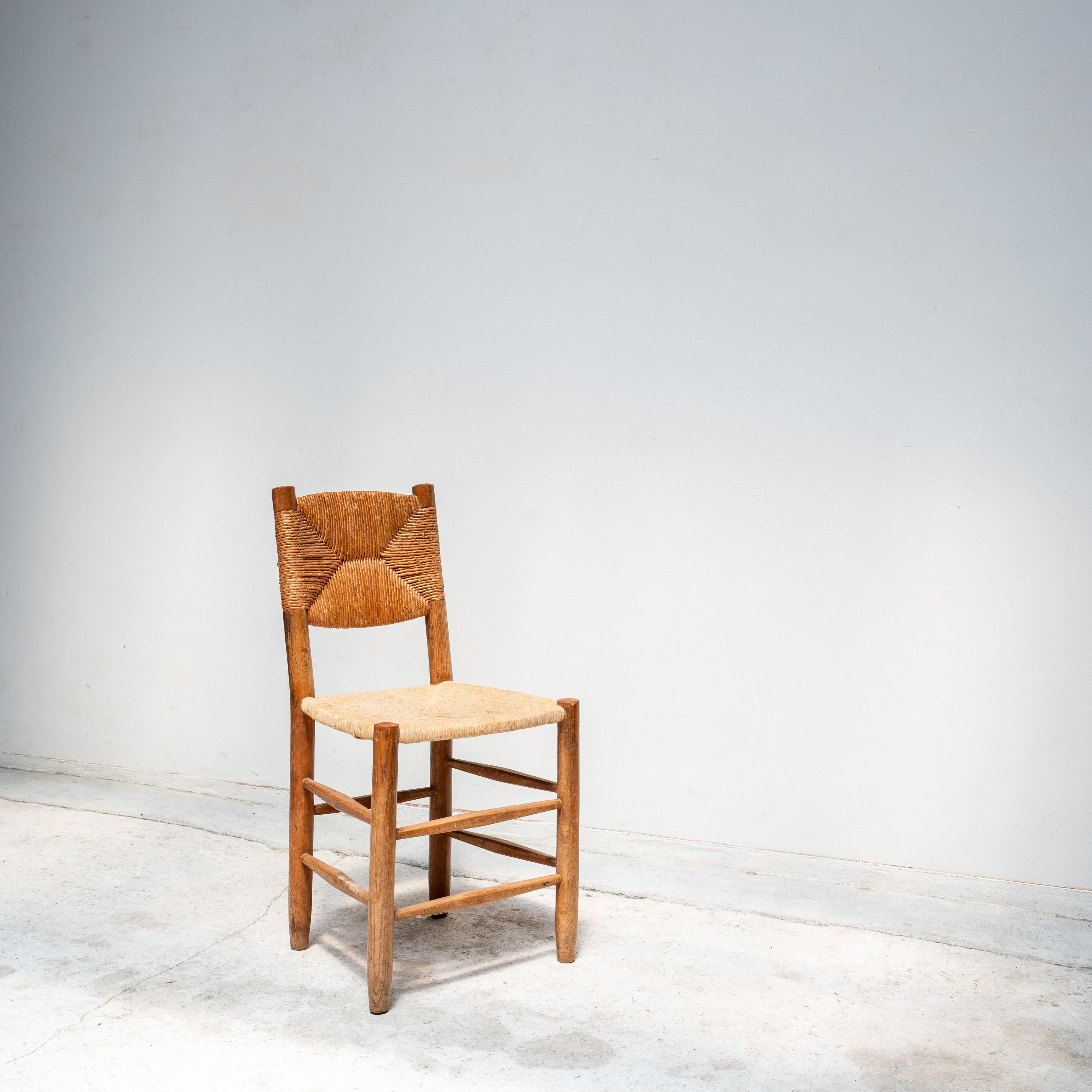 The N°19 Bauche chair, designed by Charlotte Perriand, is a quintessential expression of her design ethos: simplicity, honesty of materials, and a seamless dialogue between tradition and modernity. Produced by Sentou, the chair is constructed with a