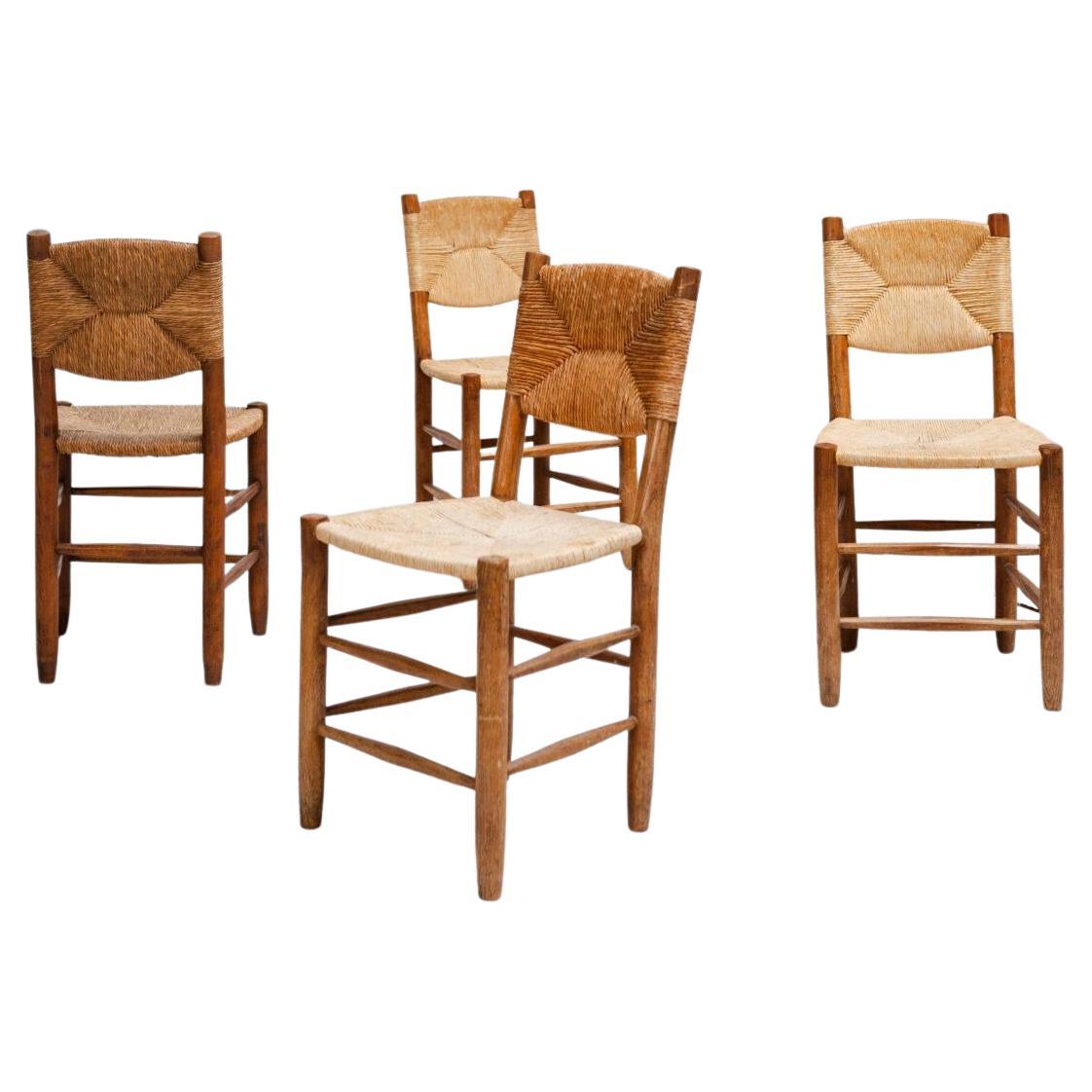 N°19 Chaises Bauche par Charlotte Perriand, lot de 4 en vente