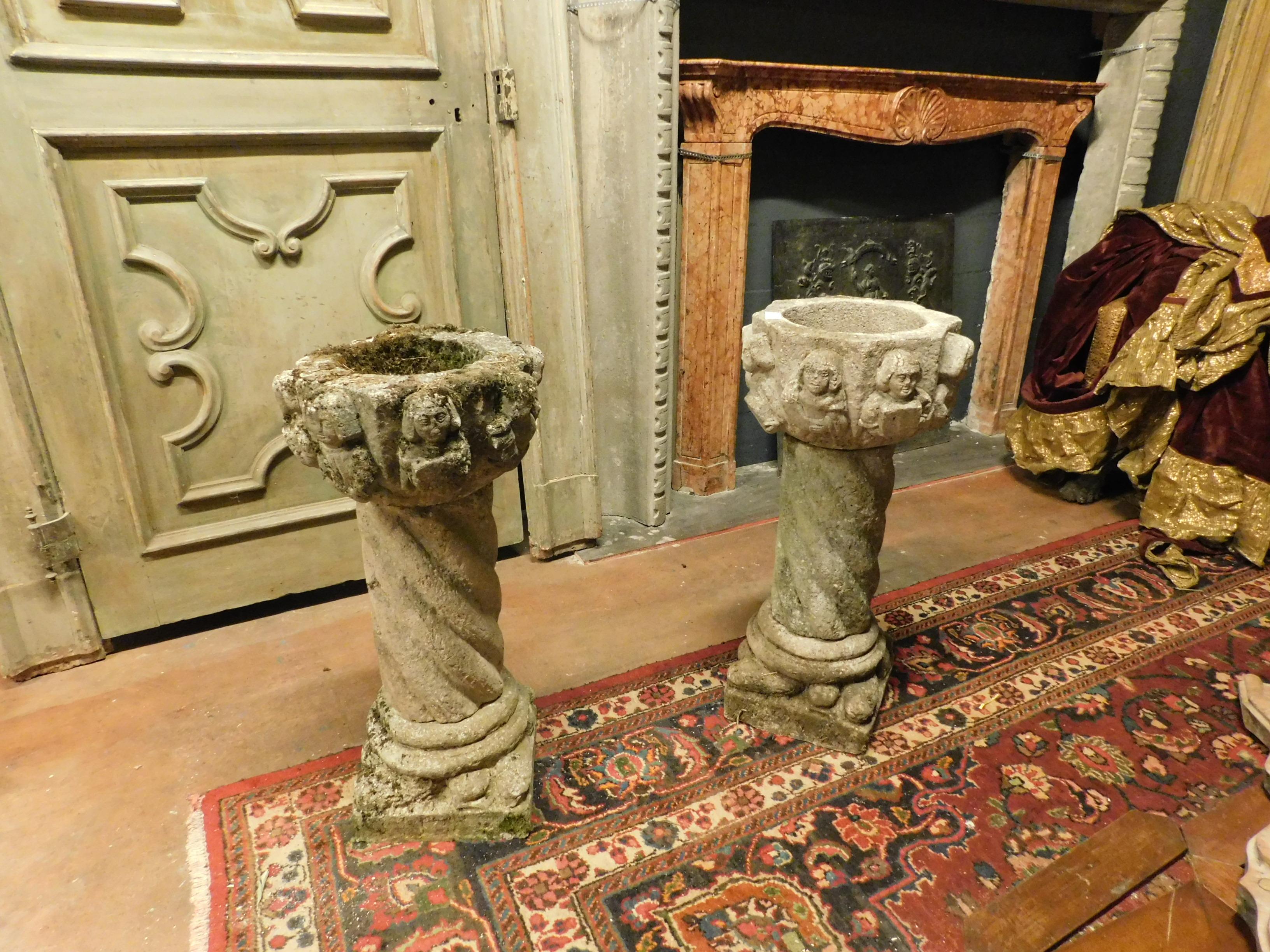 Two very Antique Italian gray stone vases, hand carved with faces on the 4 sides and torch column, for outdoor use, are very beautiful in the entrances or parks of luxurious villas. Come from a villa from the 17th century,
they measure 40 x 77 cm