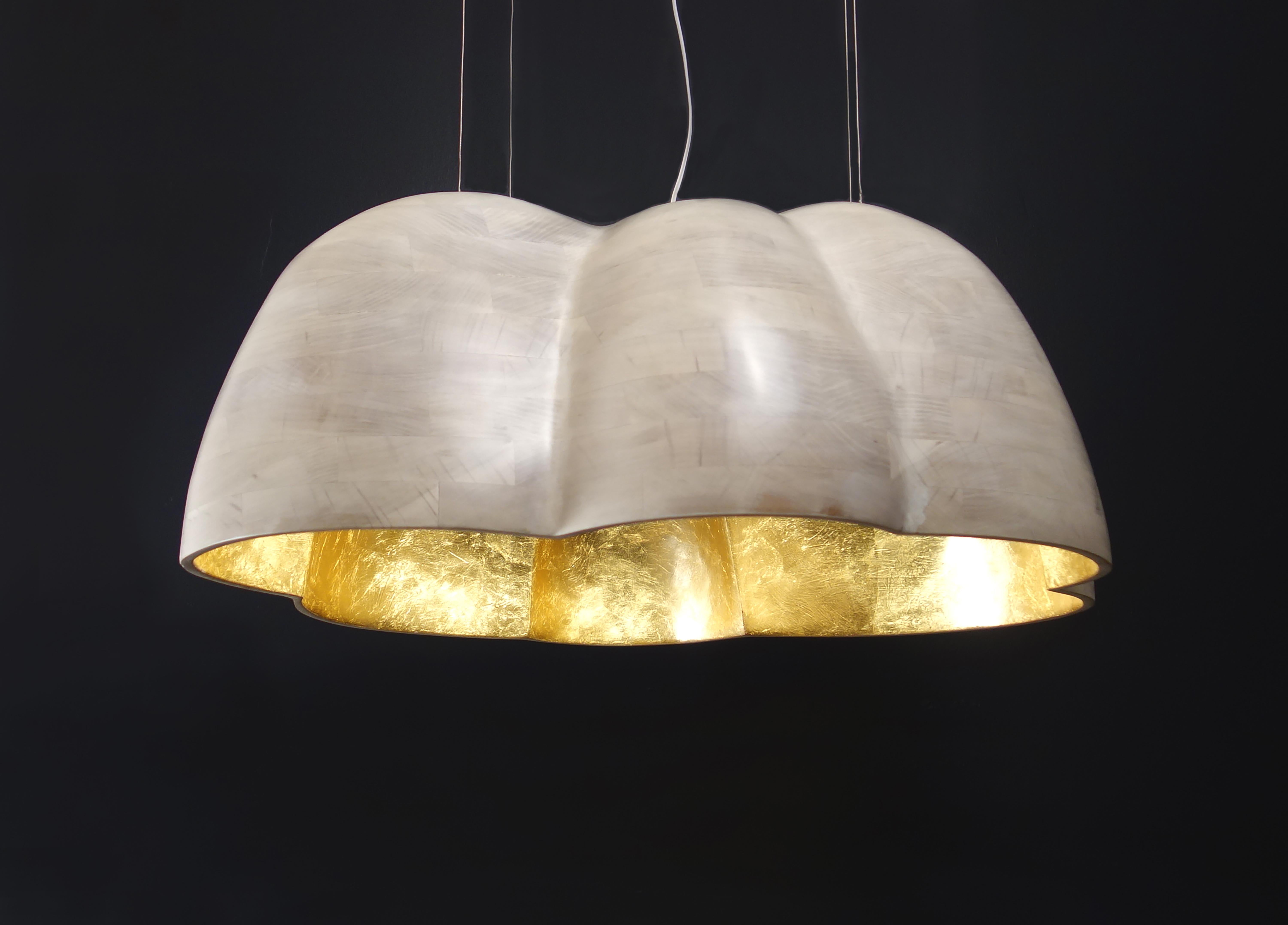 N2 cloud chandelier by Aaron Scott.
Dimensions: D 79 x W 79 x H 20.5 cm
Materials: bleached cherry, gold leaf, LED lamps.
Also available in other woods: bleached walnut. 

All our lamps can be wired according to each country. If sold to the USA