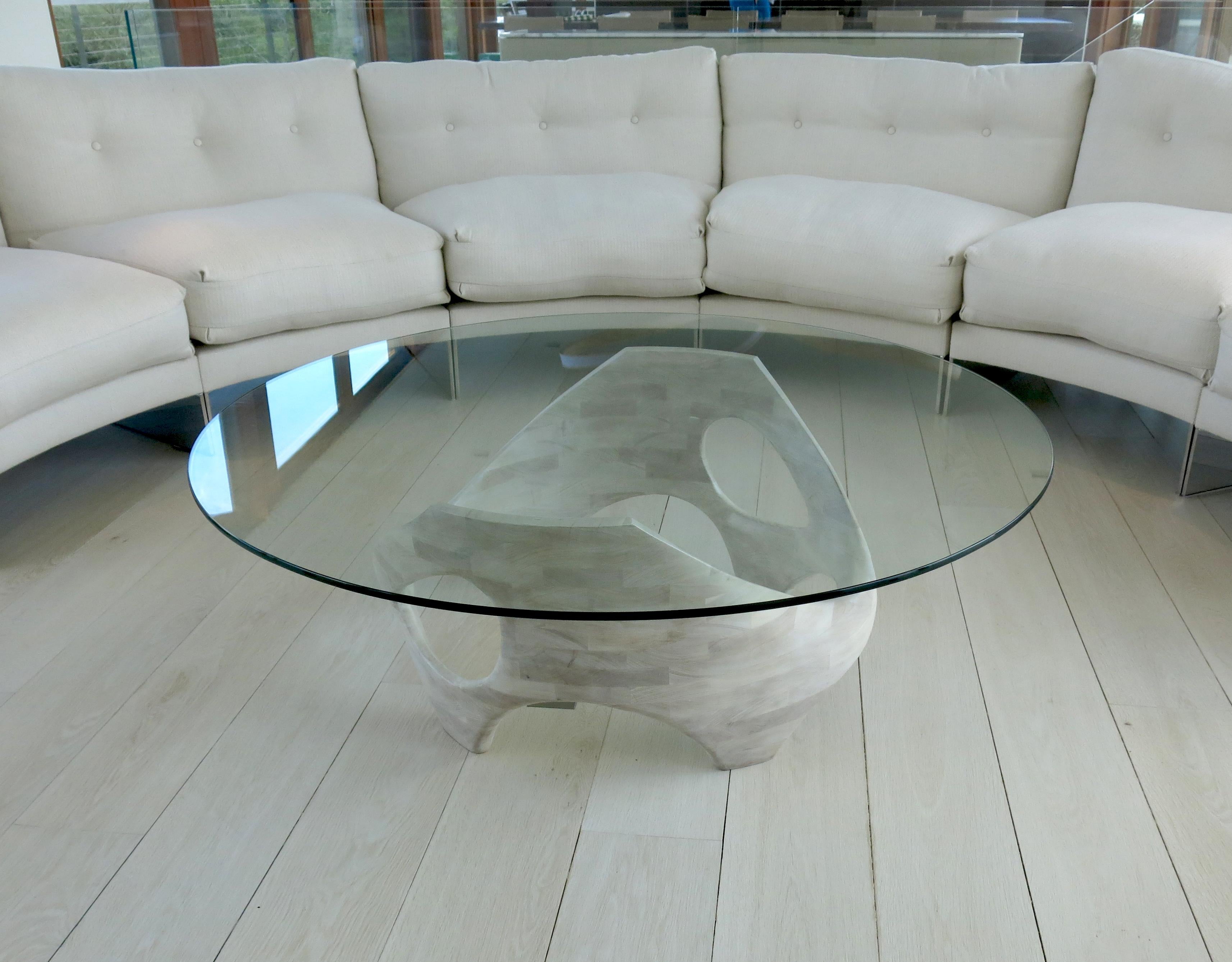 N2 coffee table by Aaron Scott
Dimensions: D 122 x W 122 x H 41 cm
Materials: bleached cherry, Glass.
Also available in other woods: bleached walnut, walnut. 


Brooklyn-based designer Aaron Scott was raised in the mountains and forests of