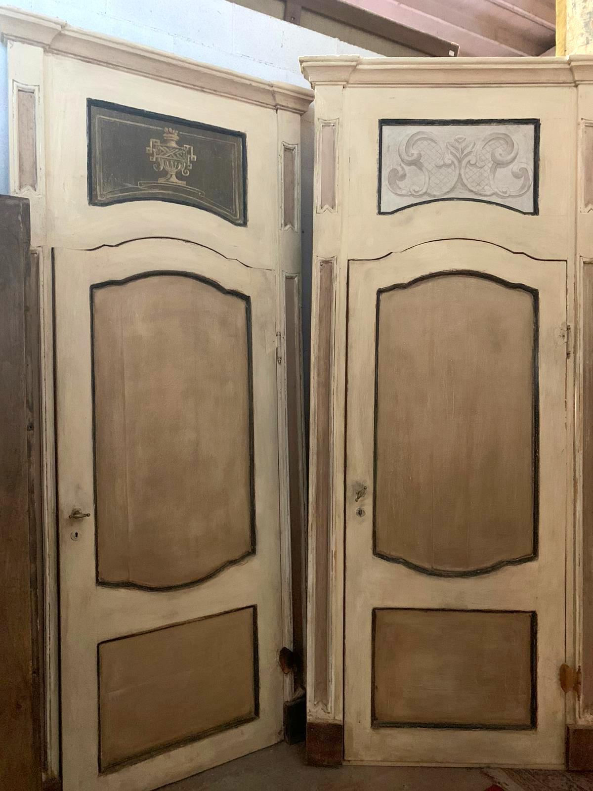 2 interior doors, hand painted with carved panels, lacquered frame, and complete with overdoor painted on canvas, built in the 18th century for a noble palace in Italy (Piedmont).
1. with frame cm L 114 x H 270, door light cm L 84 x H 202;
2. with