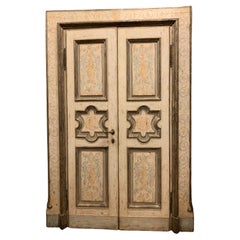 Antique N.2 lacquered wooden doors, two leaves with carved and painted panels, Italy