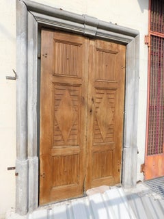 n.2 similar entrance facade portals, carved in artificial stone, Italy