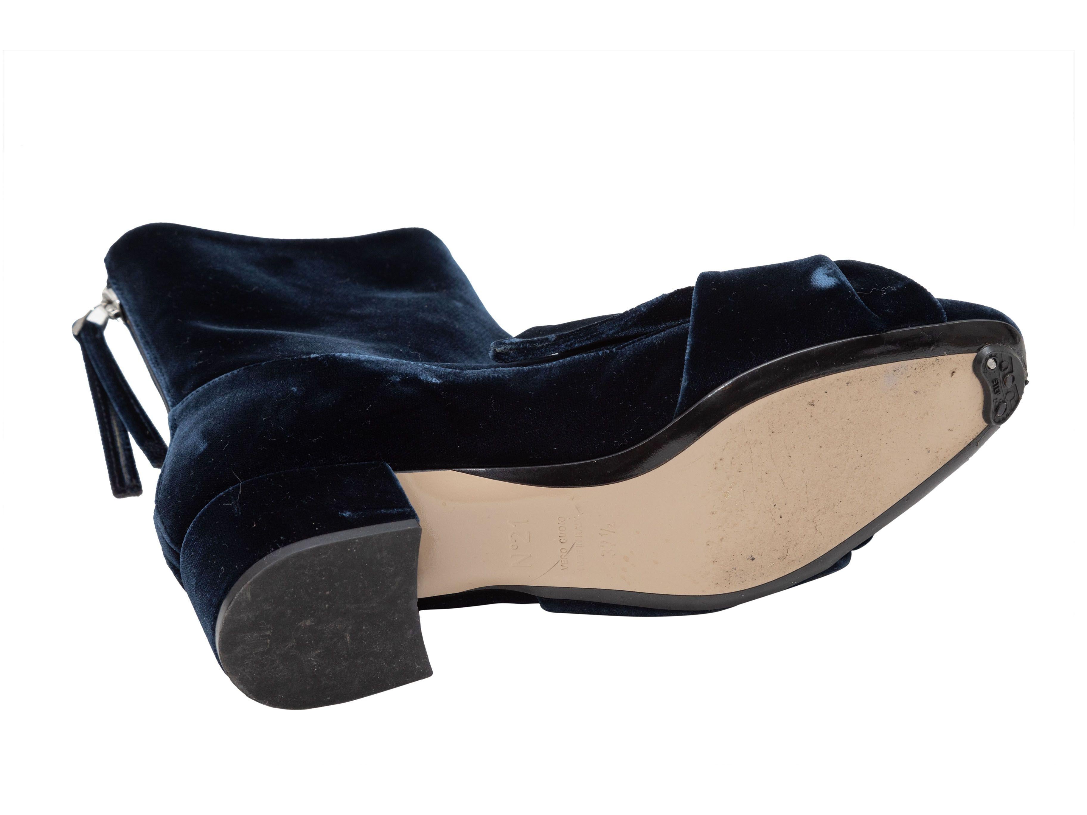 Product Details: Navy velvet ankle boots by N21. Ruffle accents at tops. Block heels. Zip closures at counters. 2