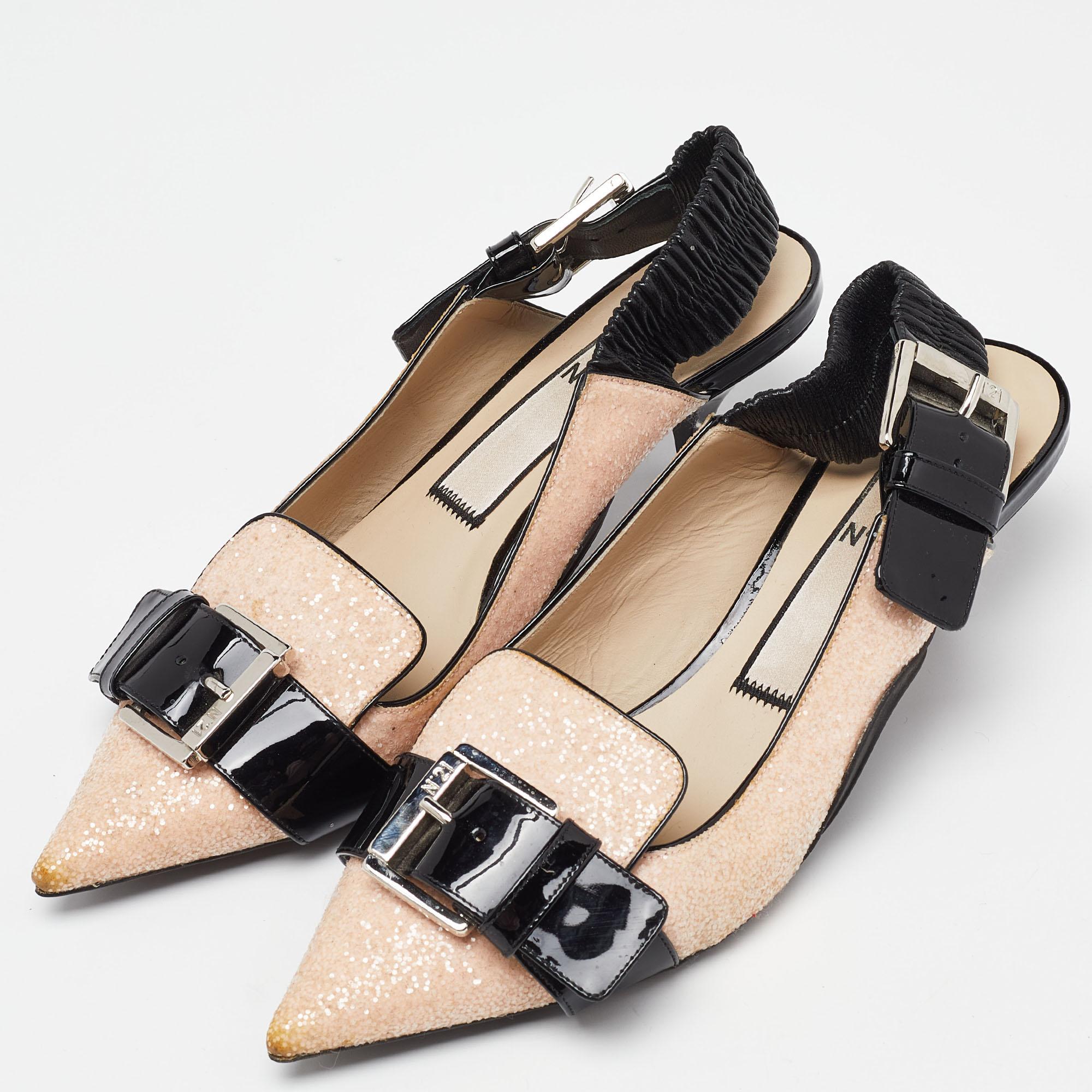Exhibit an elegant style with this pair of pumps. These designer pumps are crafted from quality materials. They are set on durable soles and high heels.
