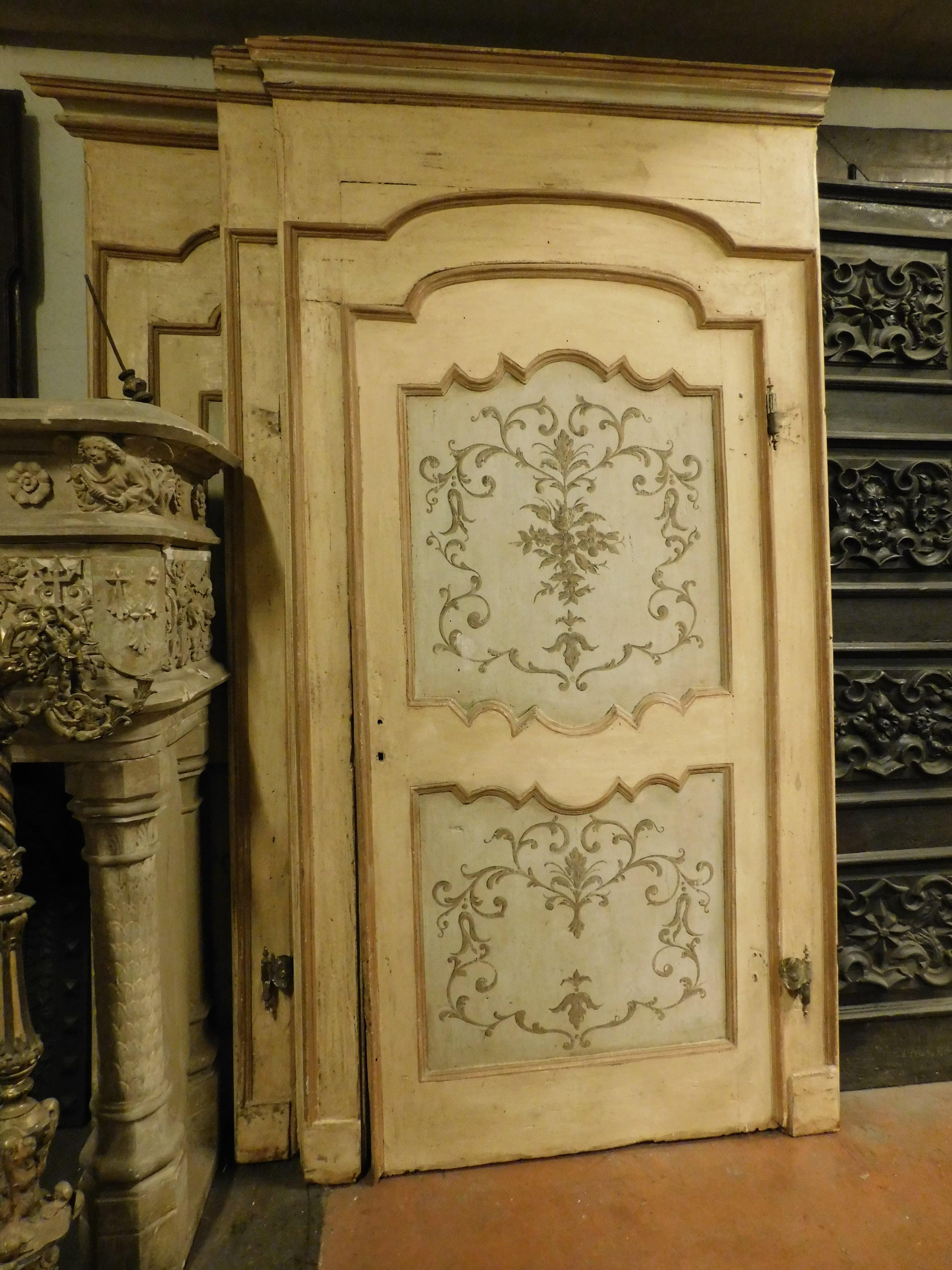 set of N.3 antique interior doors, carved in the panel, built in solid wood and hand painted with floral decorations, complete with original frame and irons, they have a gooseneck opening (bias opening), original from the first half of the 18th