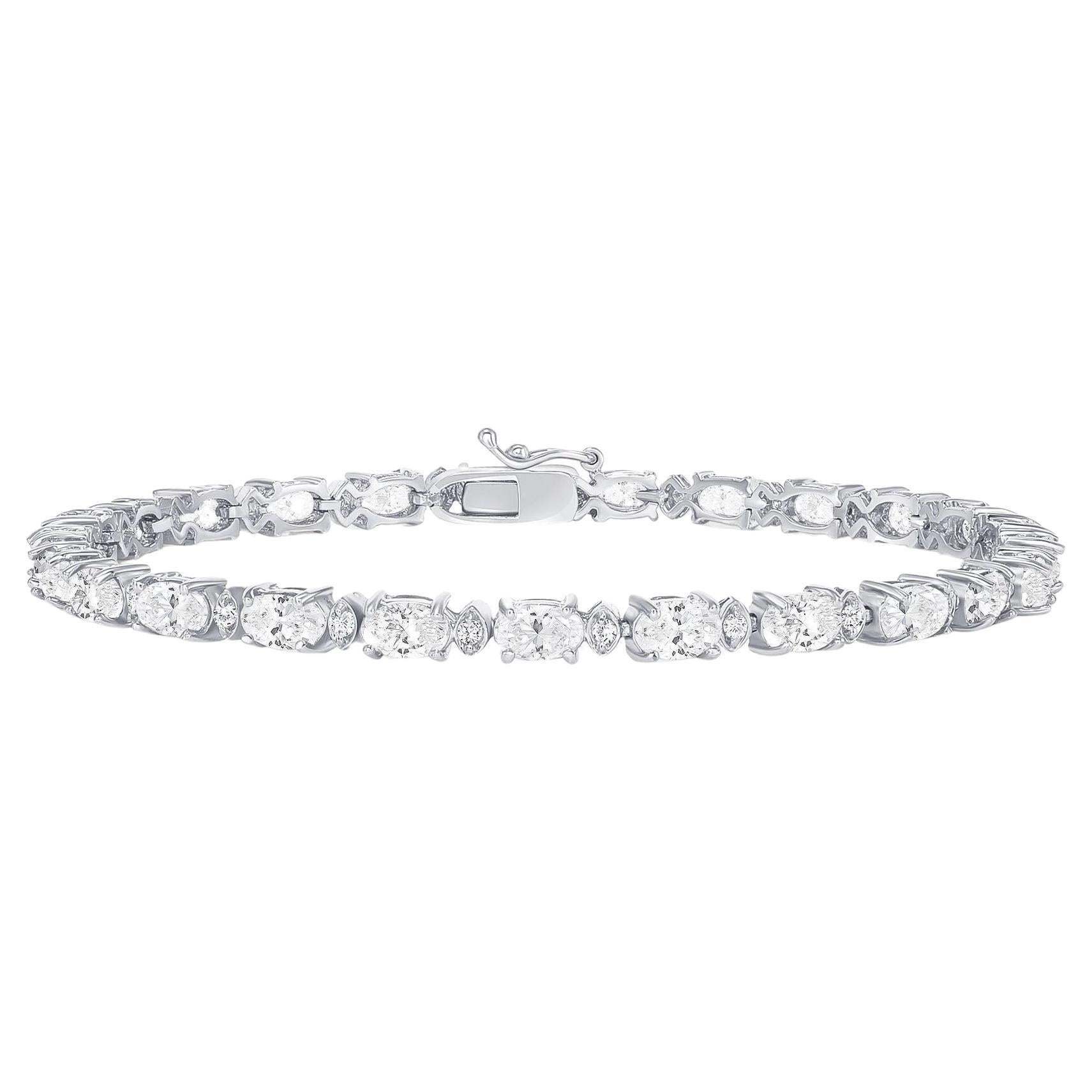 This bracelet is great compliment any outfit. Perfect gift for Anniversary, Birthday, Valentine's, and Holidays.

Bracelet Information
Metal : 14k Gold
Diamond Cut : Oval Cut Natural Conflict Free Diamond & Small Round Cut Natural Diamonds
Diamond