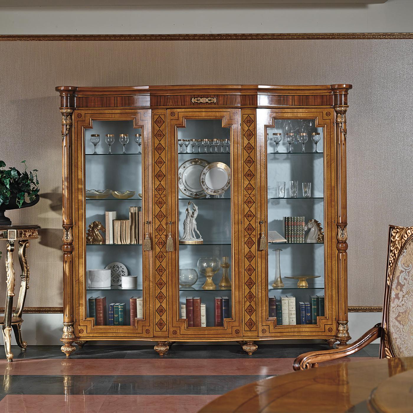 A jewel of fine joinery, this three-door display cabinet will be the focal point in any classic living space. The imposing wooden frame (including the spinning top-shaped feet) is veneered in a combination of feathered ash, rosewood, and walnut
